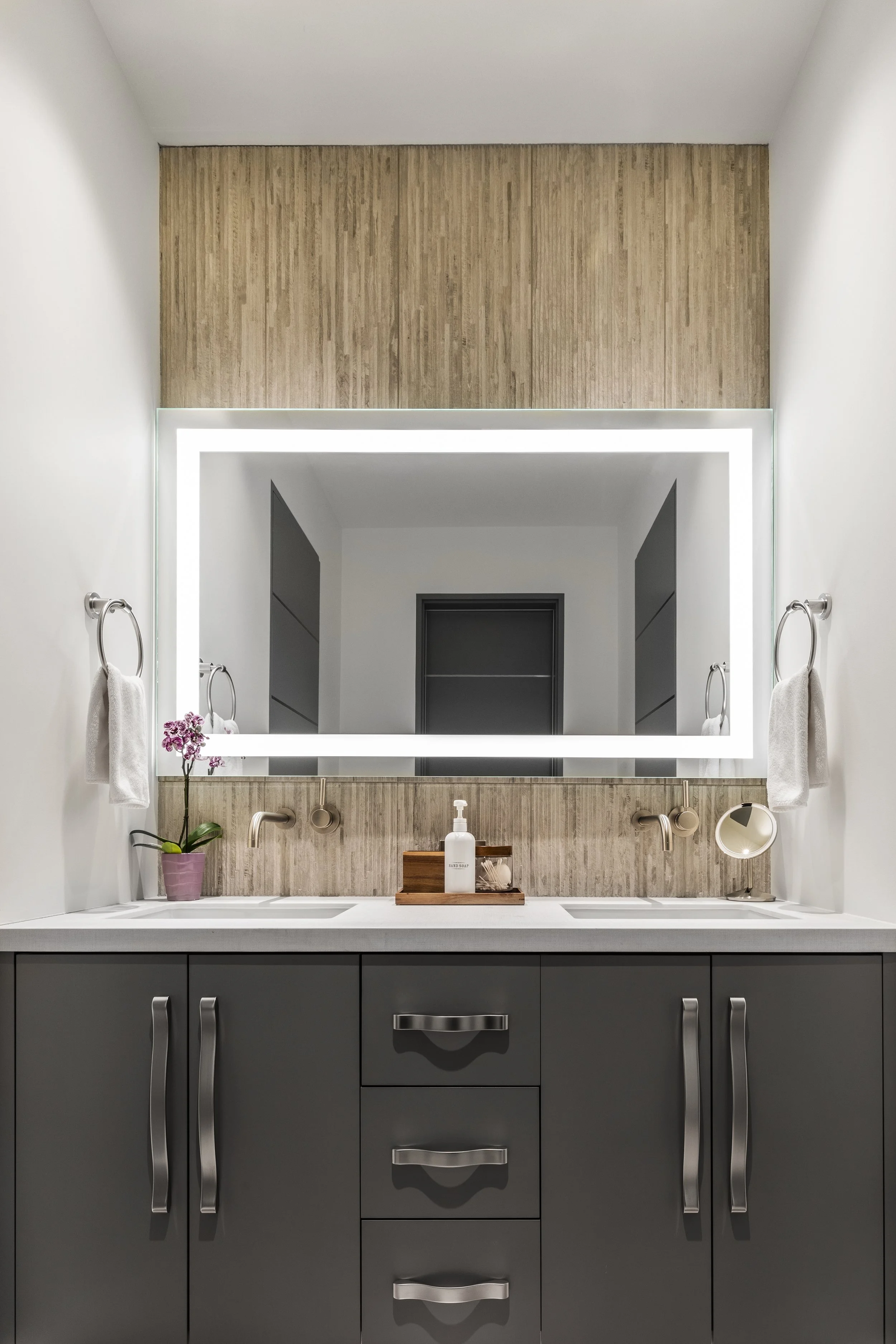 Light and airy mountain modern bathroom with textured tile in Martis Camp