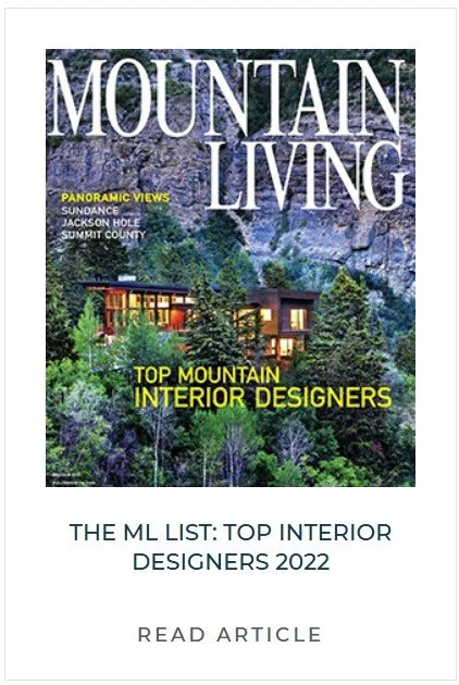 Magazine cover of Mountain Living featuring a mountain house surrounded by trees with purple and green foliage, and rocky mountains in the background.