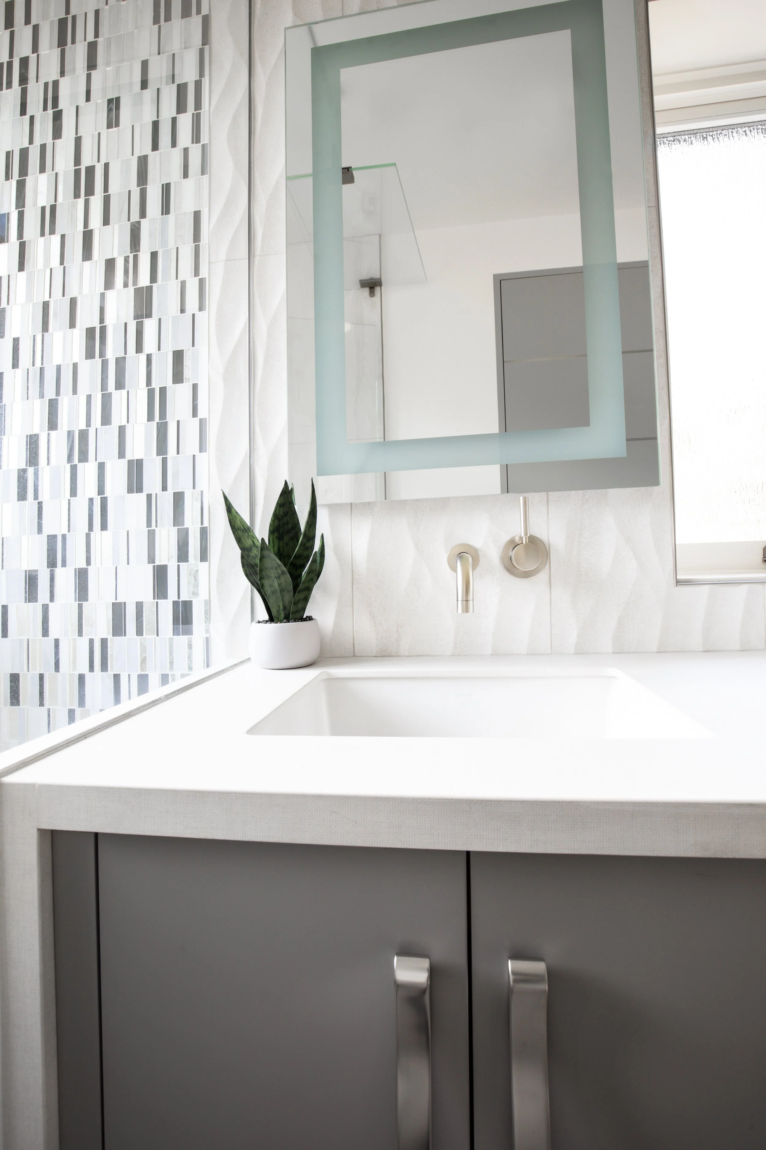Light and airy mountain modern bathroom with textured tile in Martis Camp