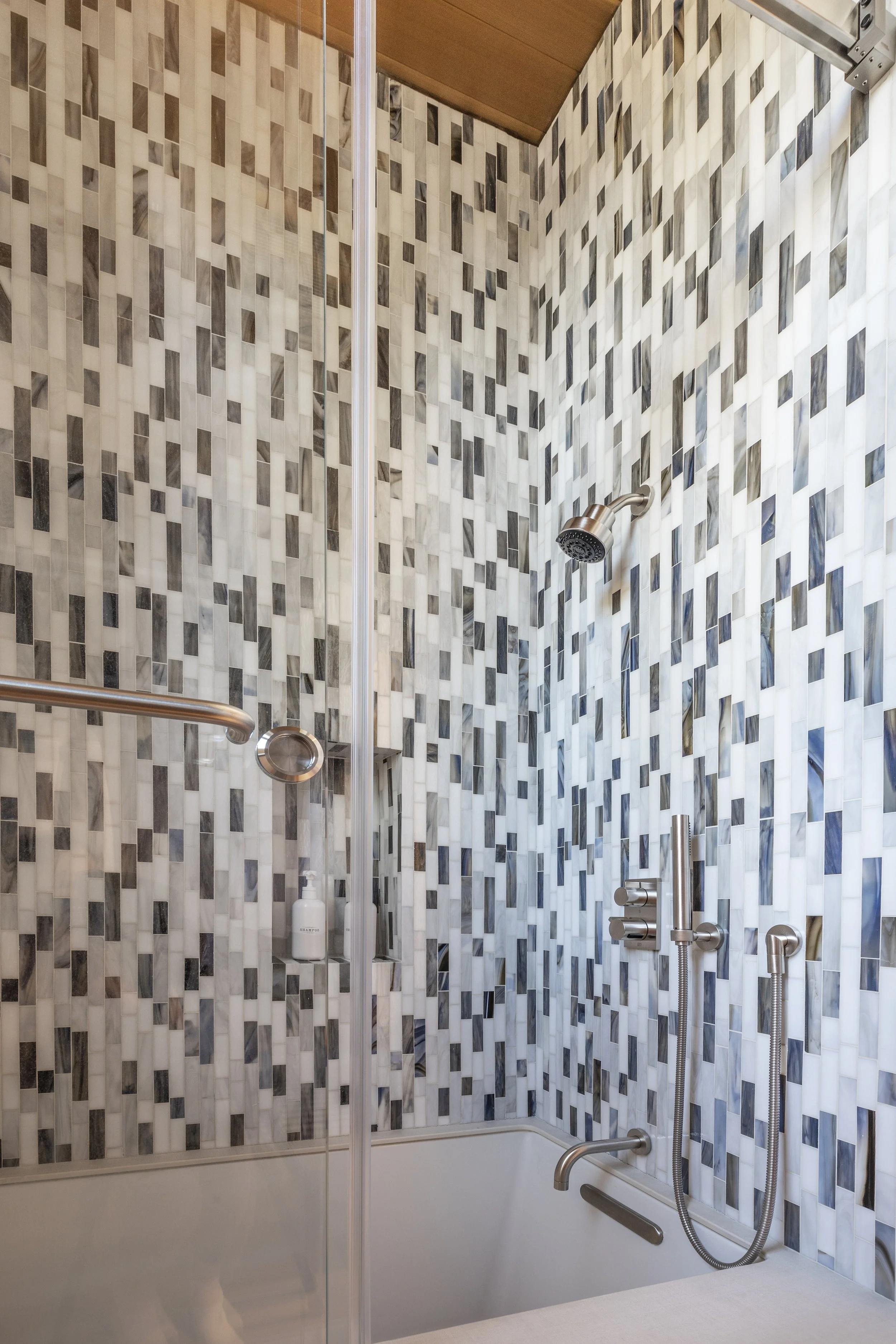 Light and airy mountain modern bathroom with textured tile in Martis Camp
