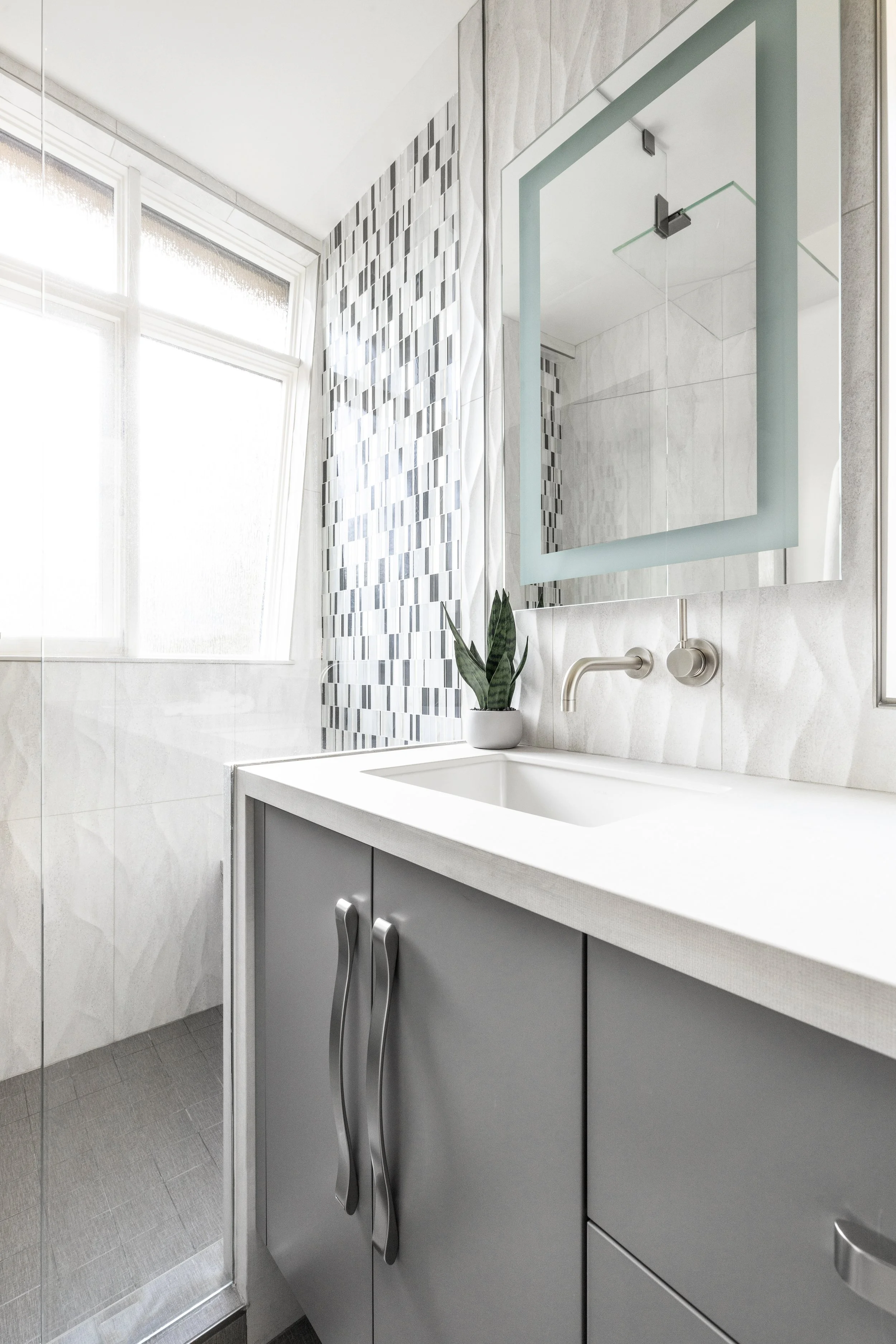 Light and airy mountain modern bathroom with textured tile in Martis Camp