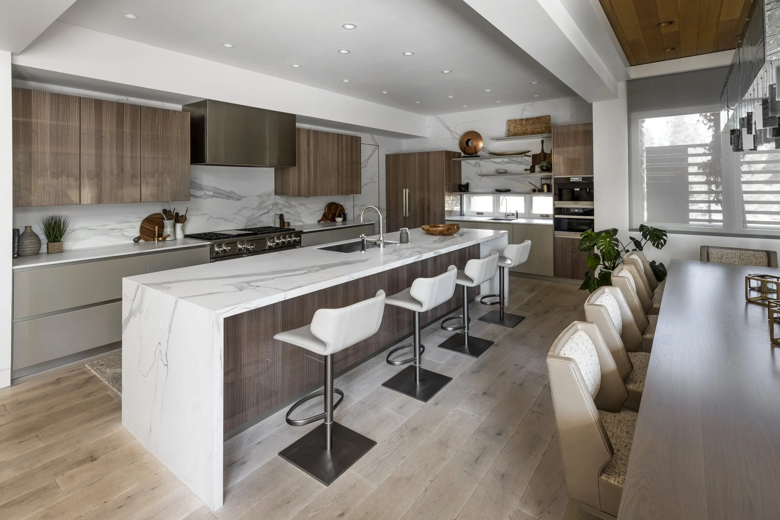 Mountain modern kitchen with porcelain countertops and backsplash in Martis Camp Truckee CA