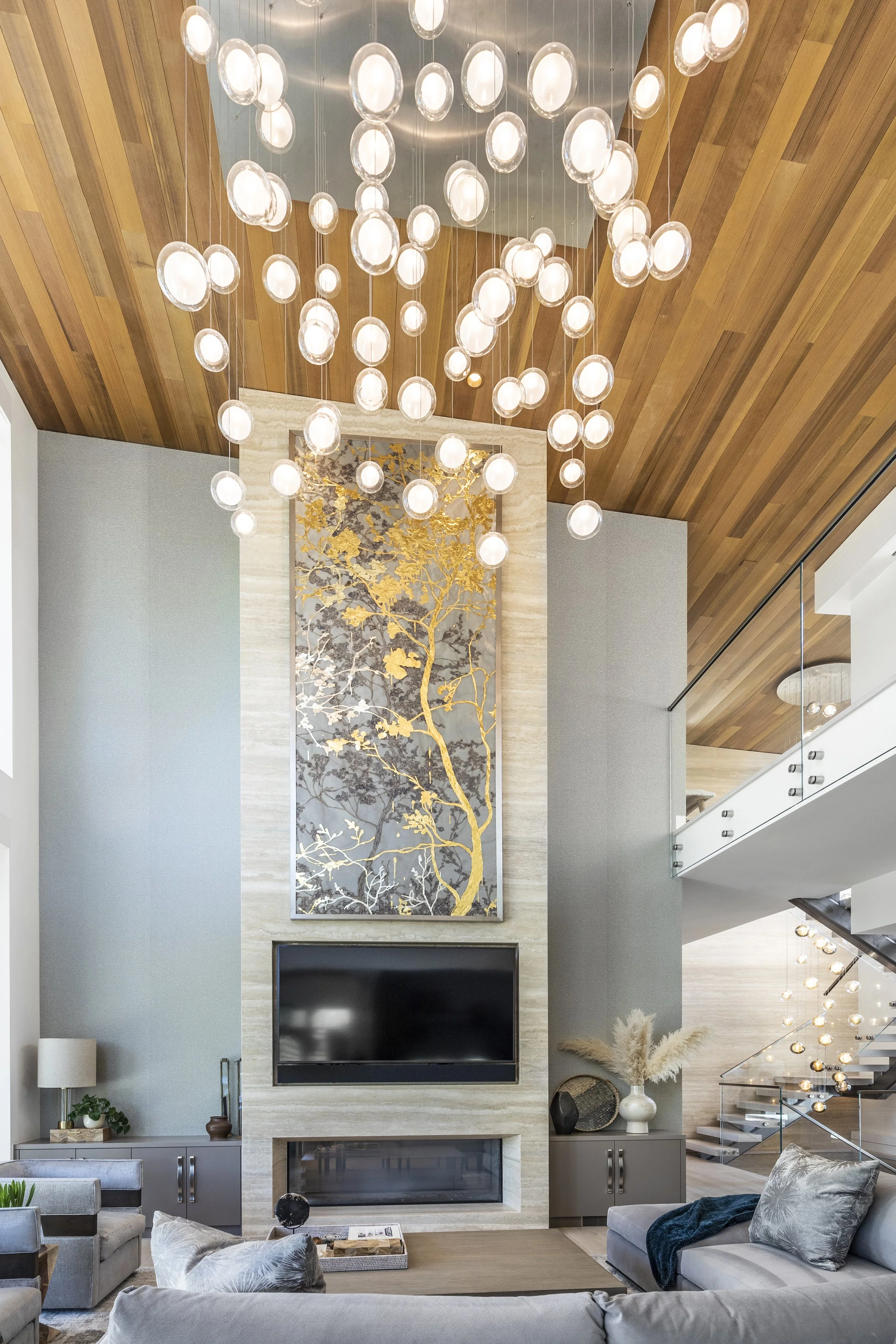 Mountain modern great room with natural stone fireplace in Martis Camp Truckee CA