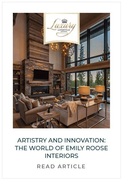 Elegant living room with high ceilings, large windows, modern fireplace, and plush sofas.