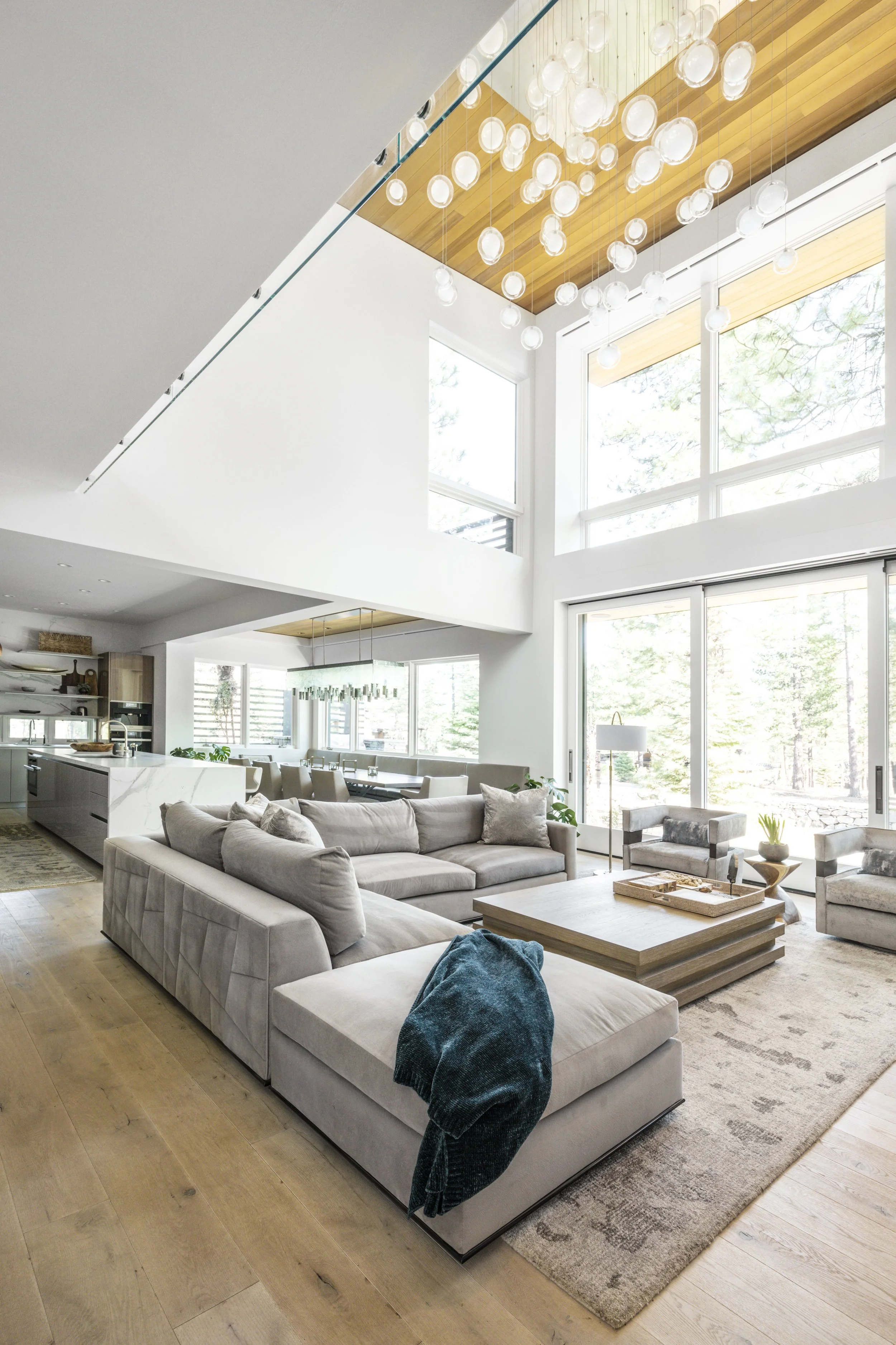 Mountain modern great room with natural stone fireplace in Martis Camp Truckee CA