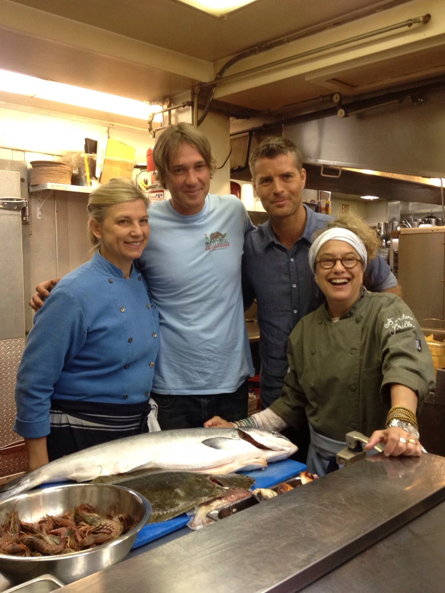A picture of seafood chefs in the kitchen with Ben Hyman