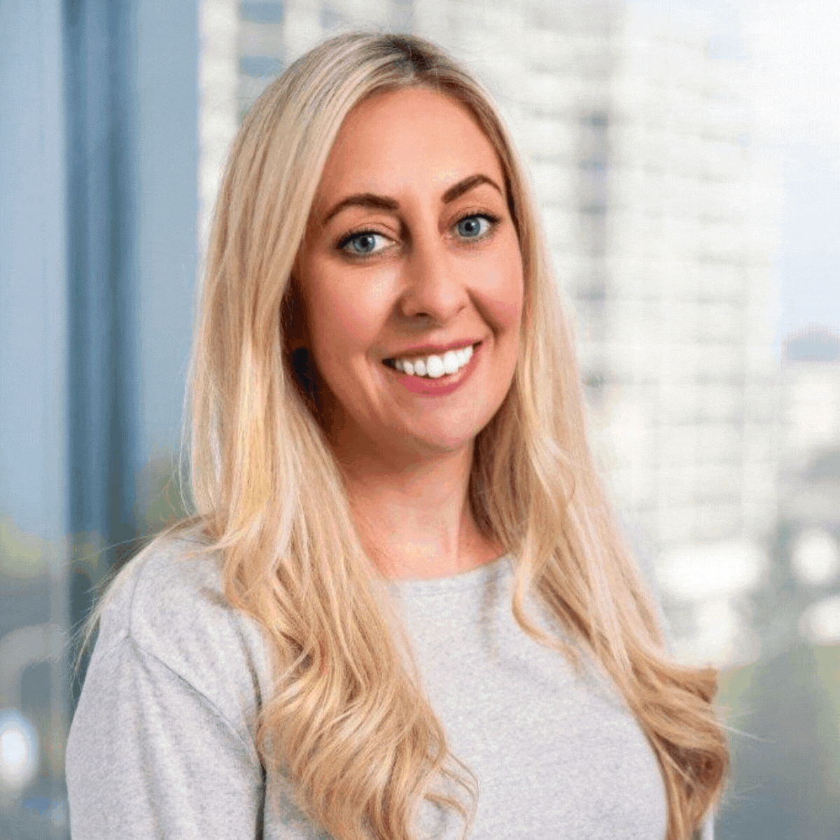 Kelly's headshot, and cartoon version