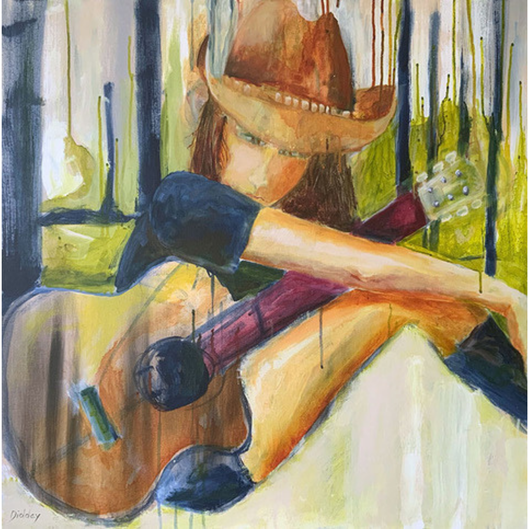 A young girl wearing a cowboy hat, sitting on a wooden floor with her arms resting on her knees, holding a large, pink, cylindrical object. The background features metal bars and a greenish backdrop.