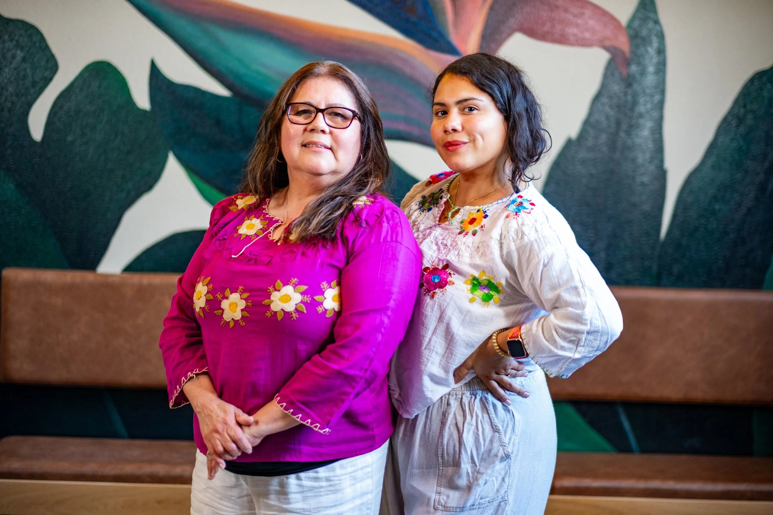 A portrait of the two women that started Salas Catering Co.