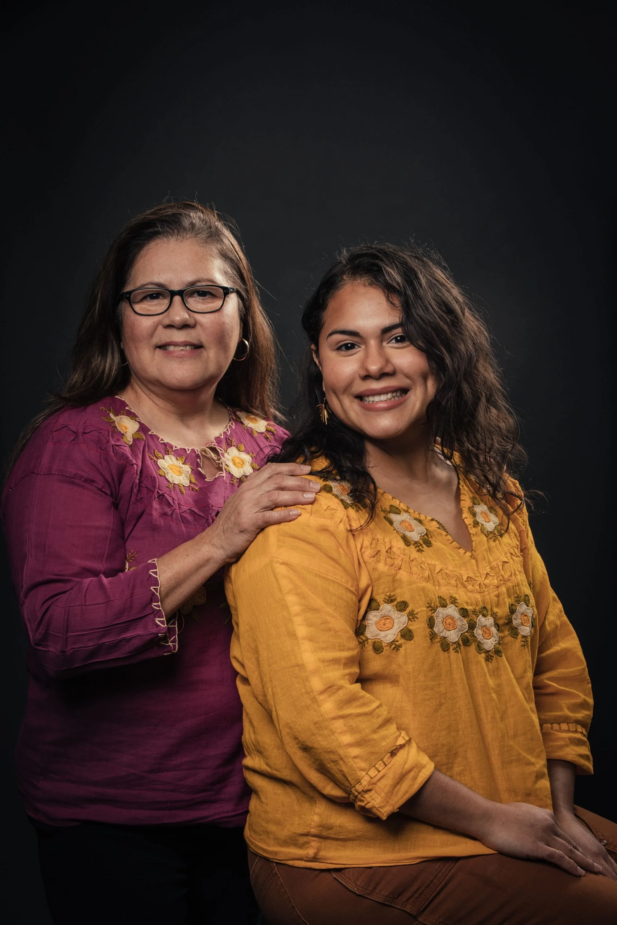 A portrait of the two women that started Salas Catering Co.