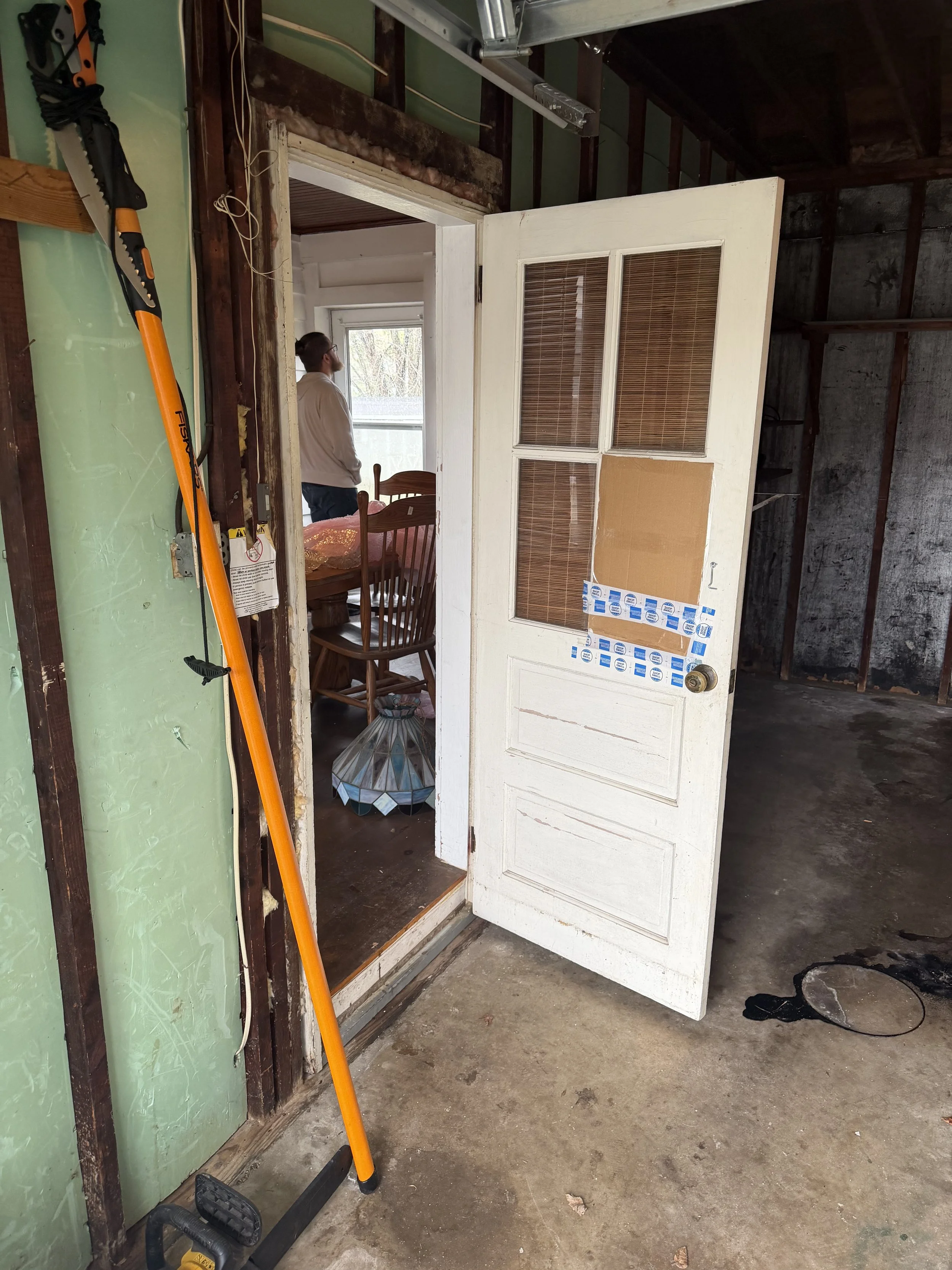 Before - Garage door with broken window