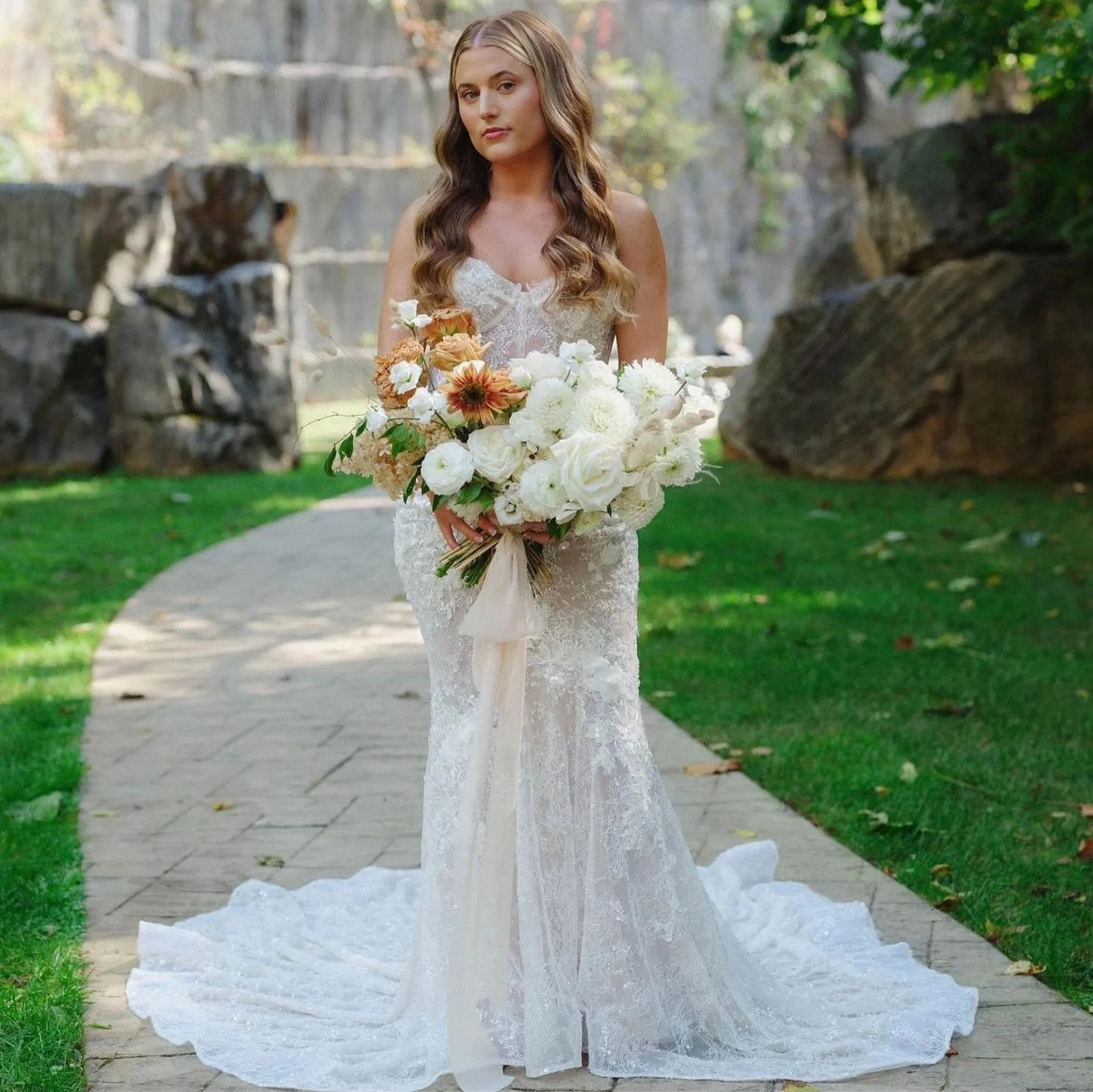Bride holding white wedding bouquet for preservation in Outer Banks, NC by Beaux’s Botanical Designs