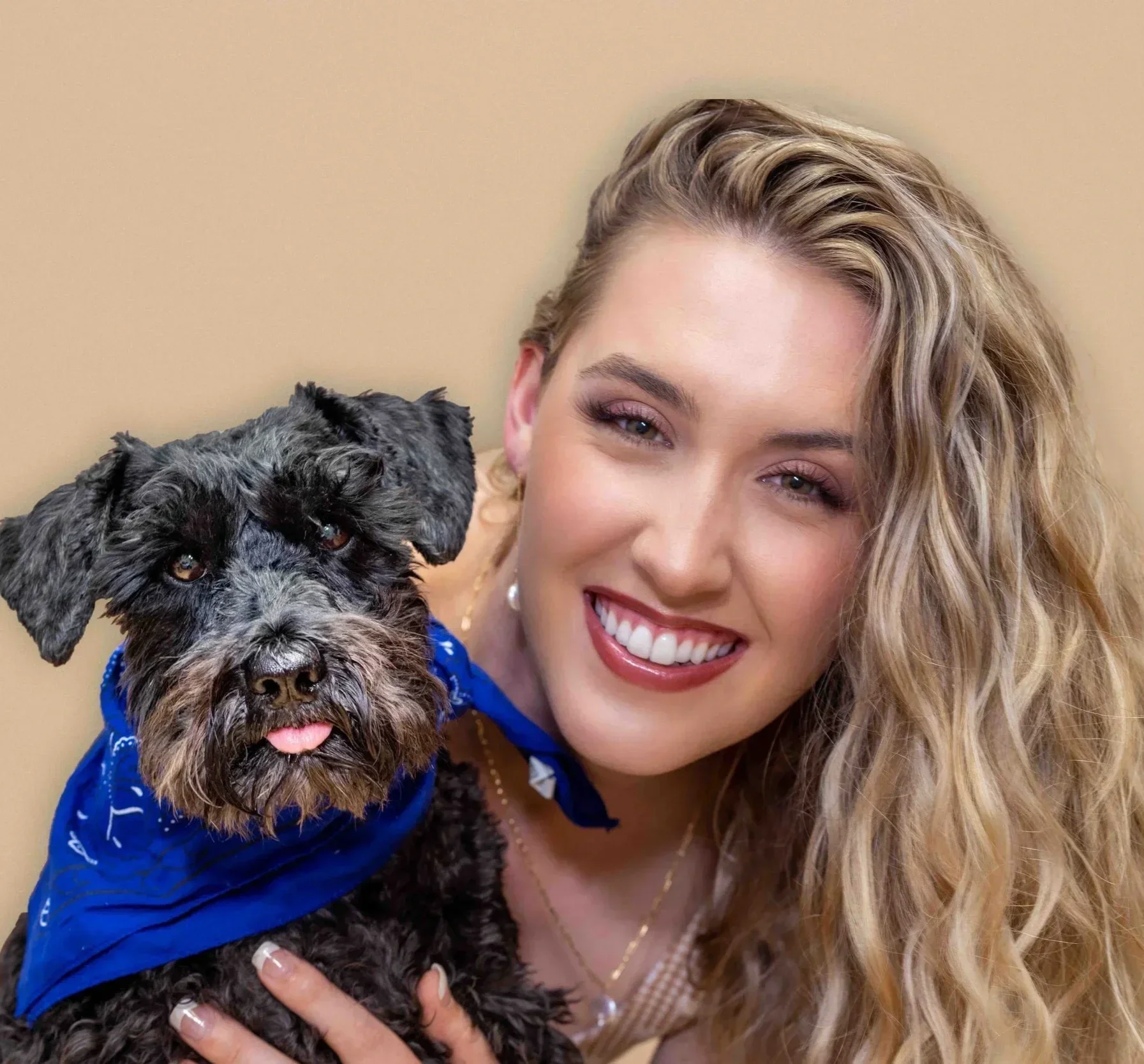 Whitney Burroughs with her dog Beaux, photographed in the Outer Banks where Beaux’s Botanical Preservation is based