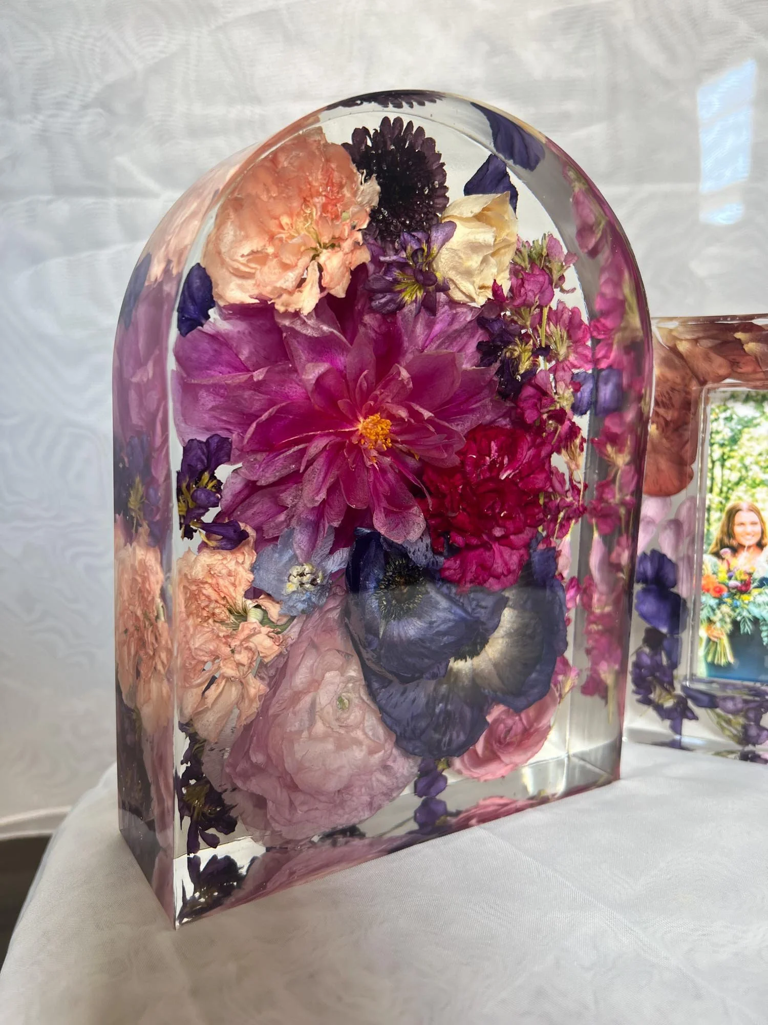 Arch resin floral block showcasing jewel-toned preserved wedding flowers, created by Beaux’s Botanical Preservation in the Outer Banks