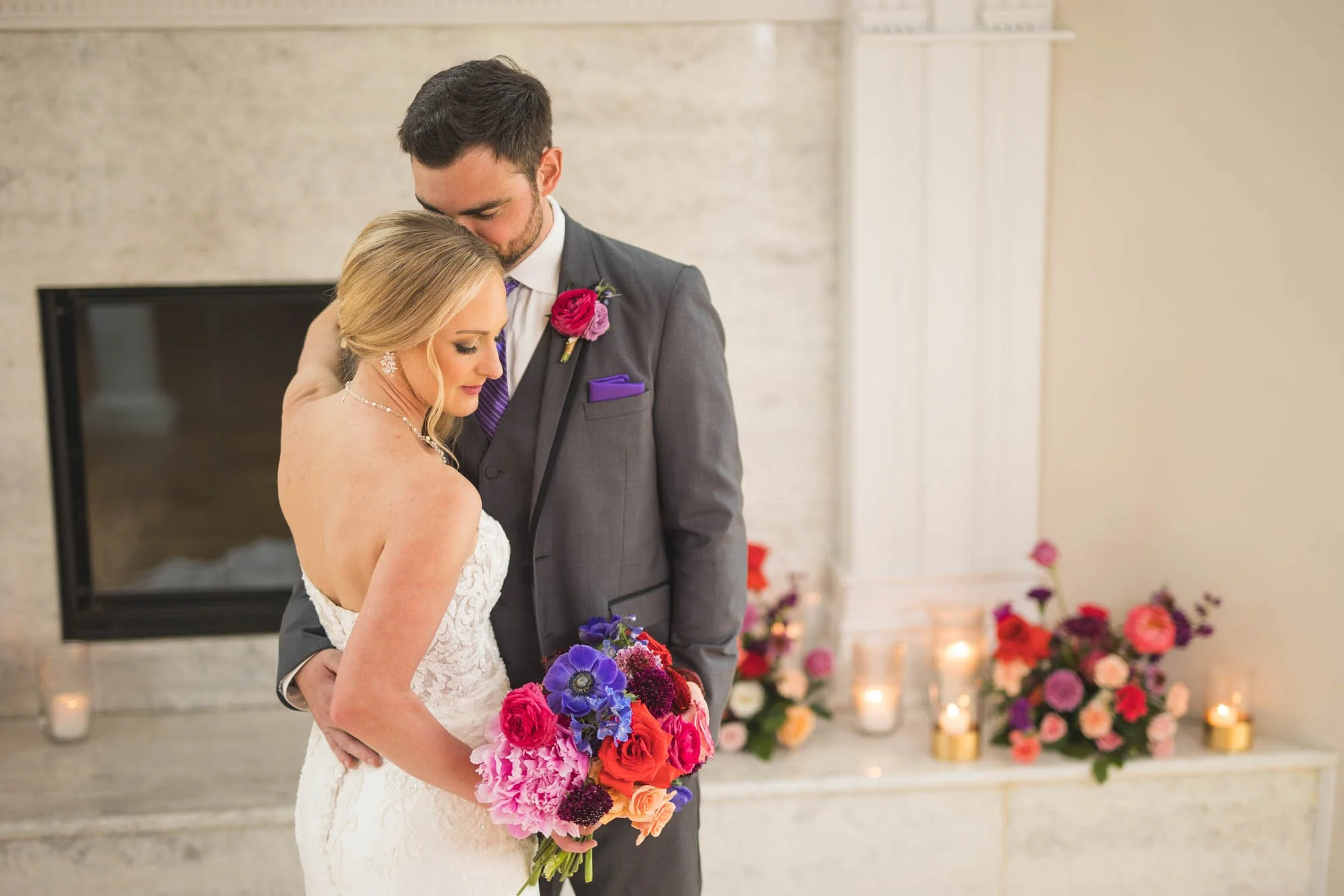Wedding couple holding a jewel-toned bouquet later preserved by Beaux’s Botanical Preservation in Outer Banks NC