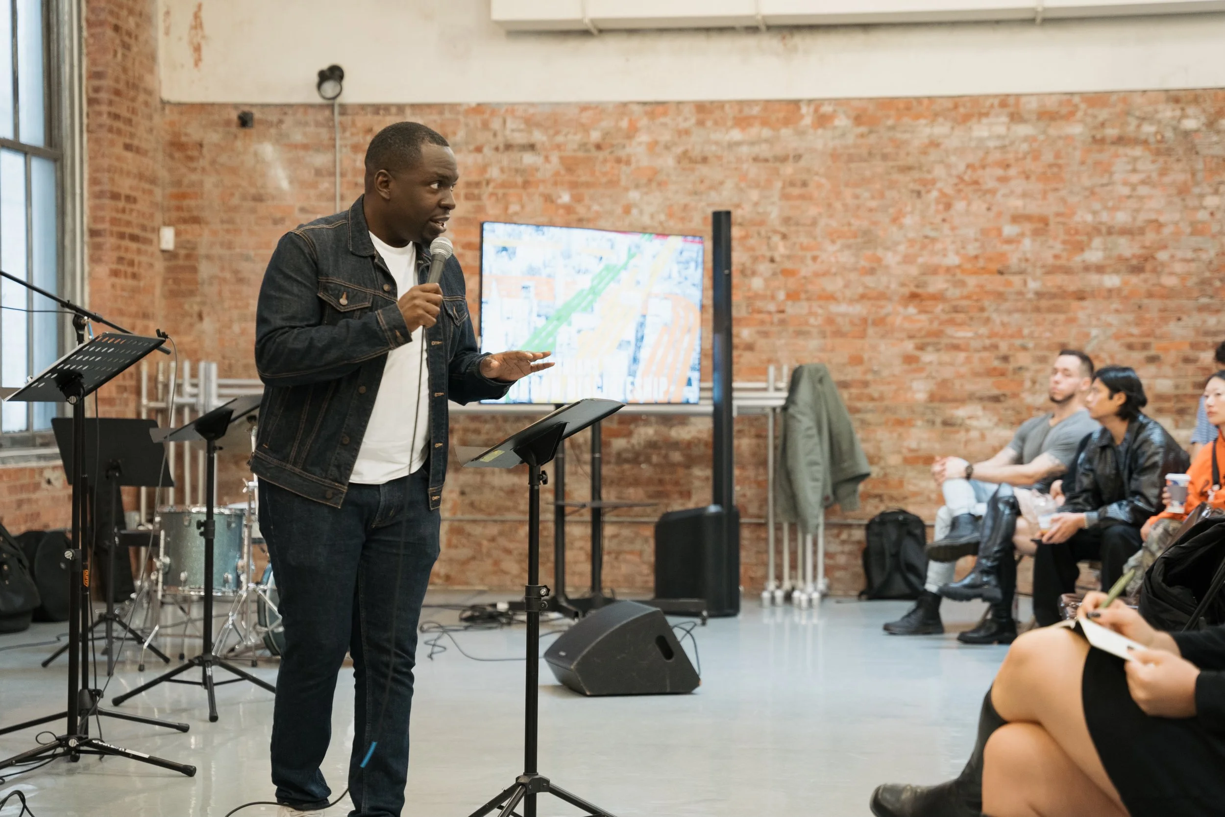 Pastor Brandon Dunkley preaching a sermon and providing pastoral leadership