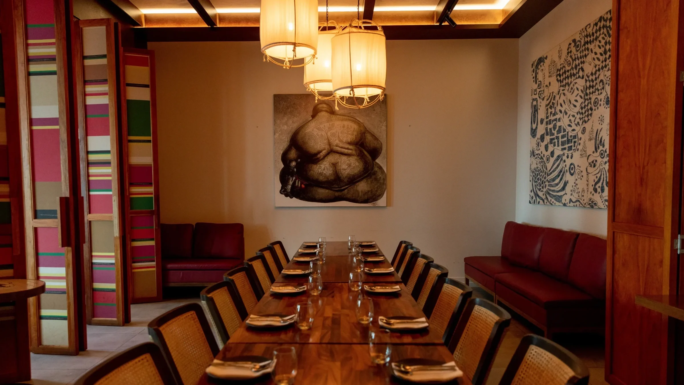 photo of a private dining room with a long set up table and chairs at Jumbo Thai