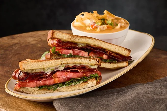 BLT sandwich and soup served at Firebirds Wood Fired Grill in Plano, Texas.