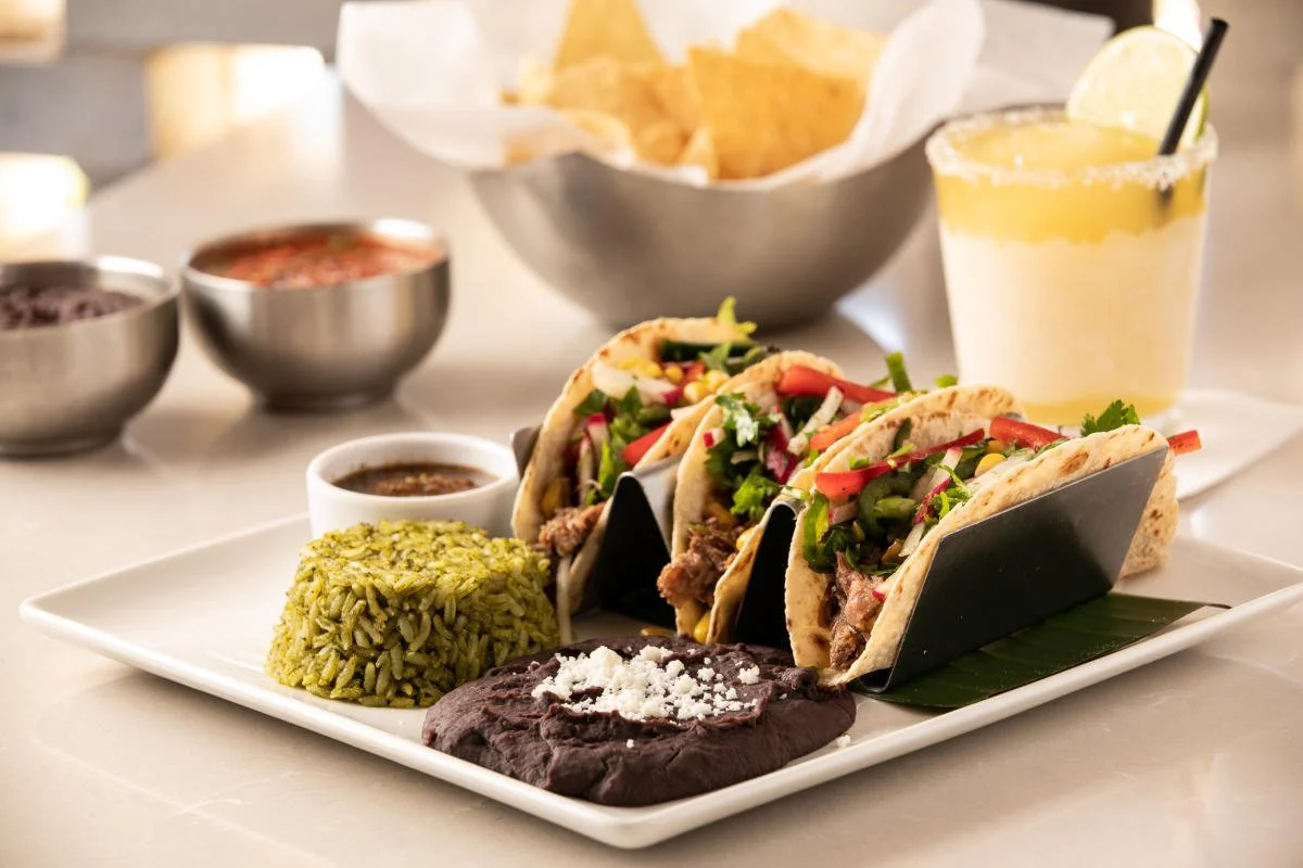 Tacos with rice, beans, and a margarita at Gloria's Latin Cuisine in Plano, Texas.