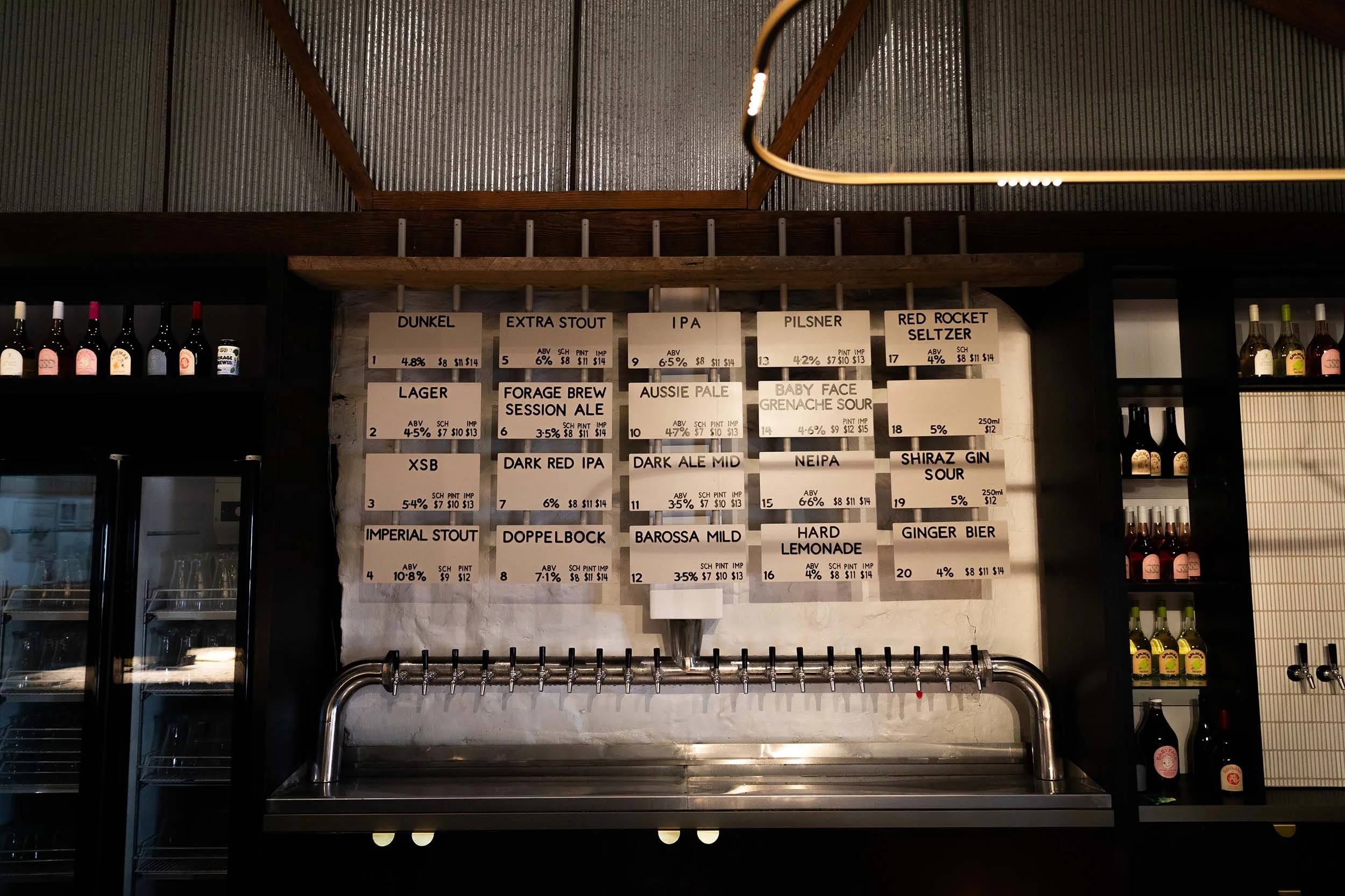 Craft beer tap list at Old Mill Brewery, Tanunda Barossa Valley, showing a range of beers on tap including IPA, Pilsner, Lager, stouts, seltzers and Forage Brew Session Ale with pricing and ABV information.