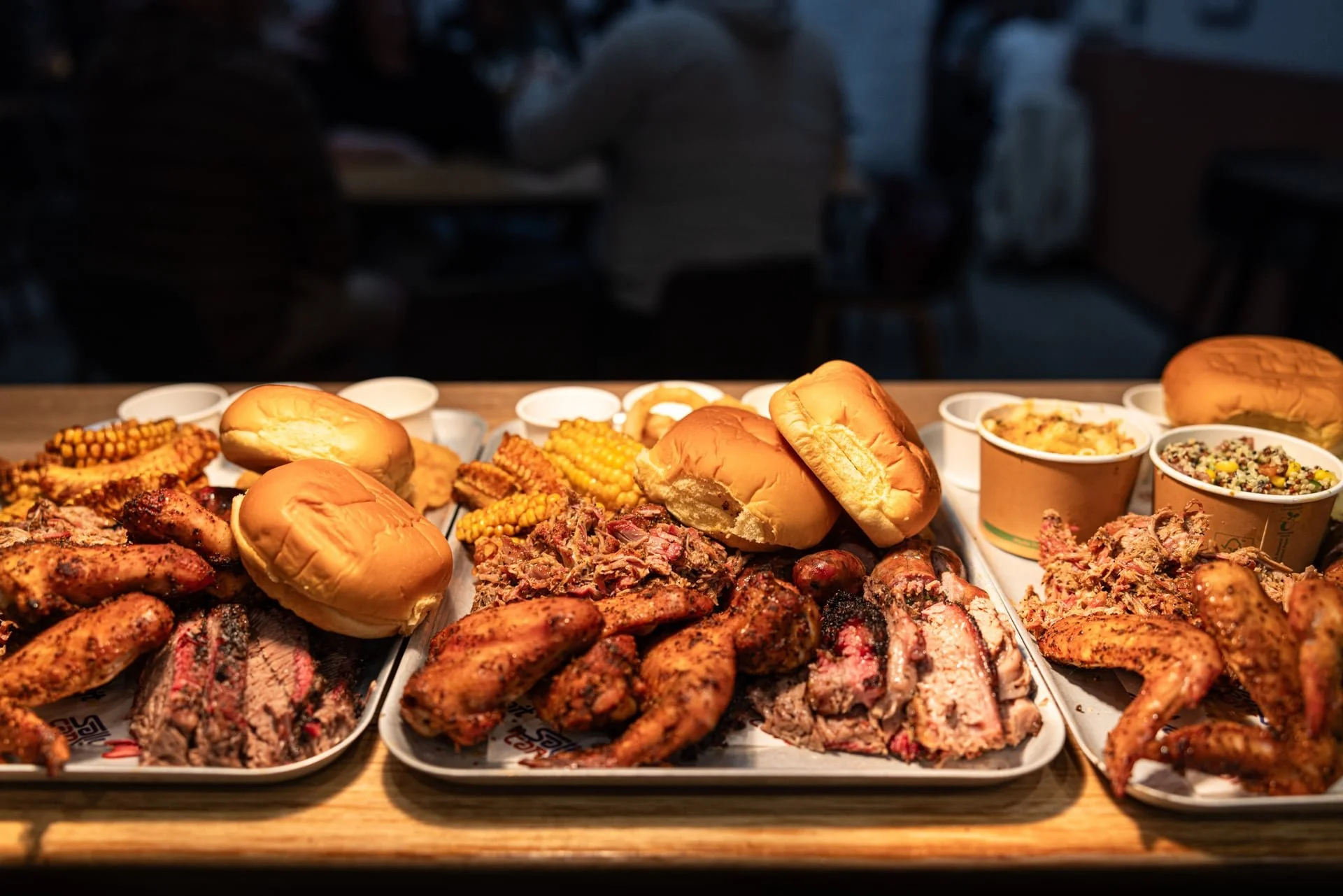 Authentic Texas Style BBQ at Old Mill Brewery featuring smoked chicken wings, ribs, pulled pork, baked beans, corn and southern-style sides, served at the only American-style barbecue event in Tanunda, Barossa Valley.