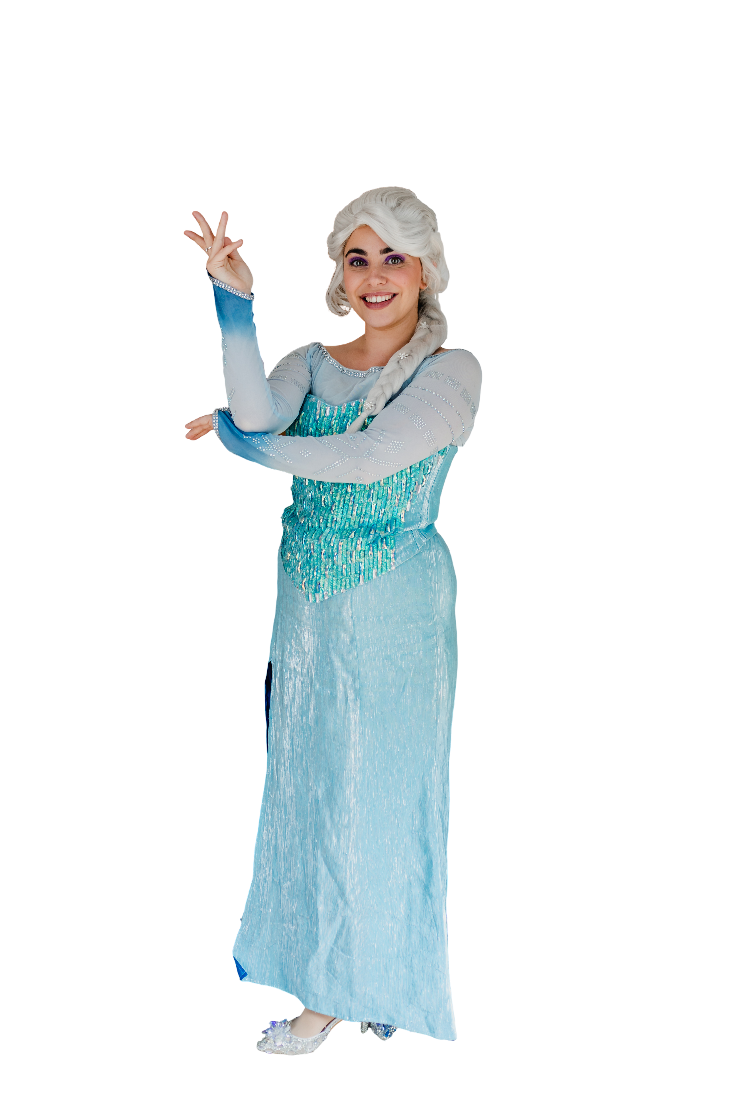 Woman dressed as Elsa from Frozen, smiling and posing with one hand raised