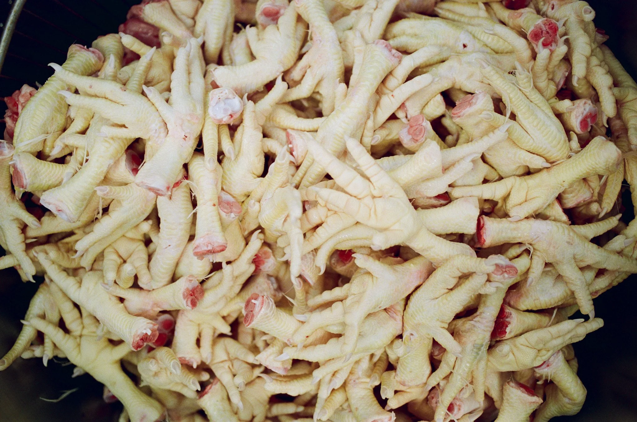 Chicken ingredients prepared for RIKI RAMEN BĀ’s slow-cooked broth