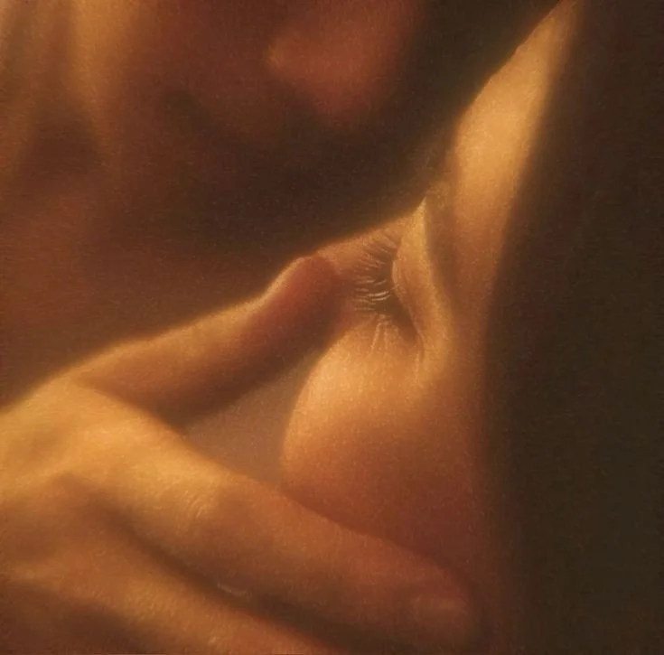 Close-up of two people about to kiss, focus on their faces and lips