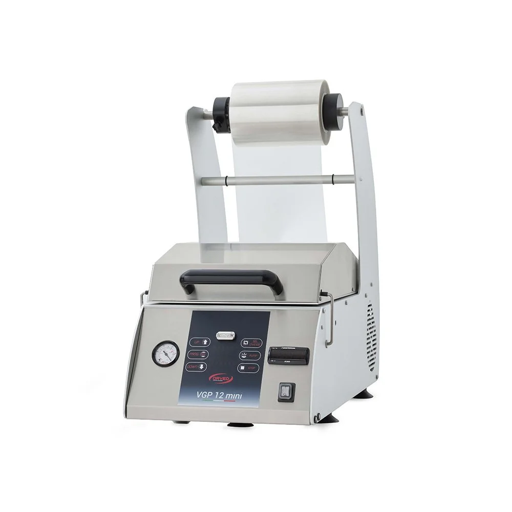 Macchina per il riscaldamento di materiali, con un rullo in cima e controlli digitali sulla parte anteriore.