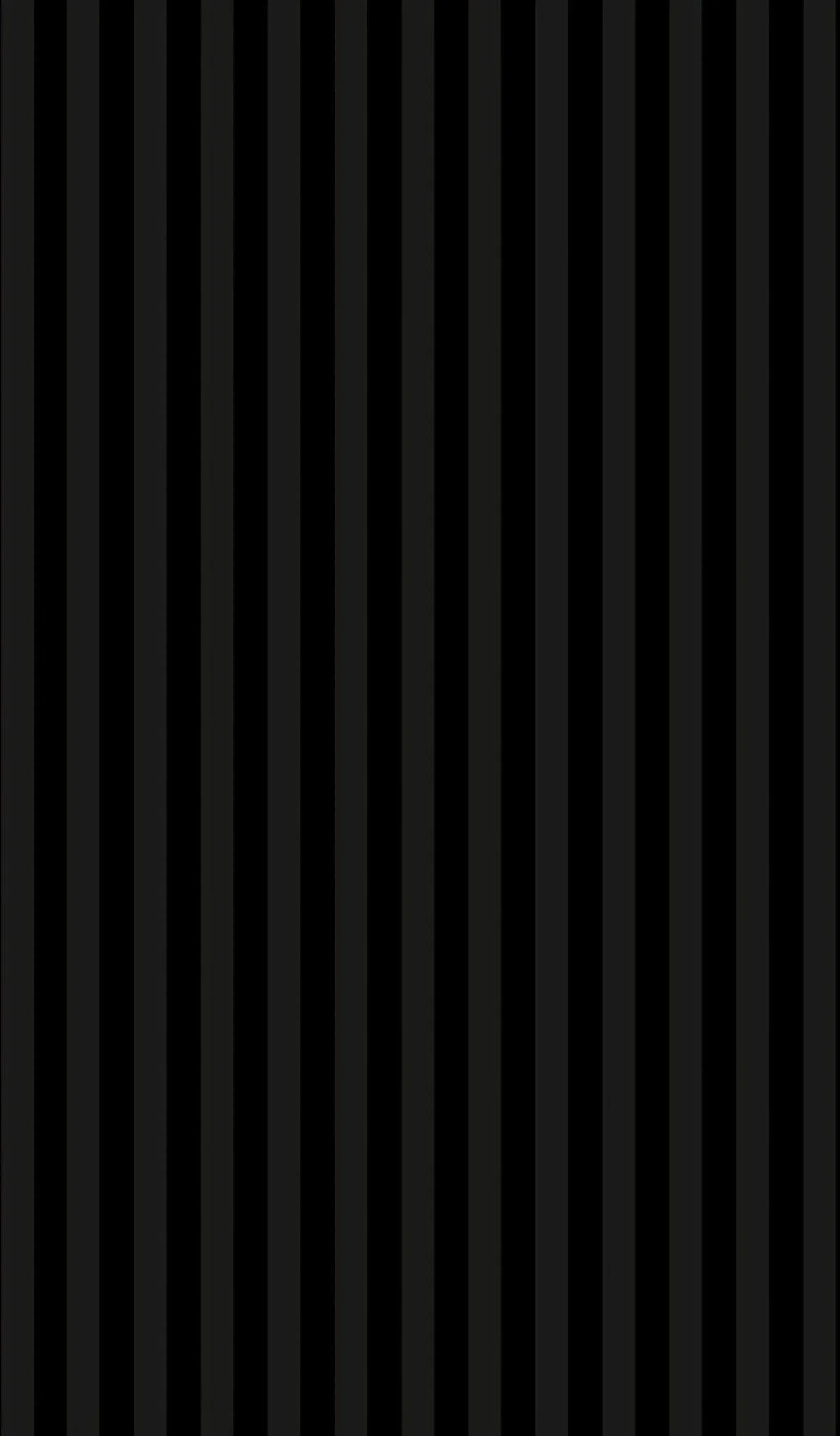 A person watering plants in a garden with multiple potted plants and a blue watering can.