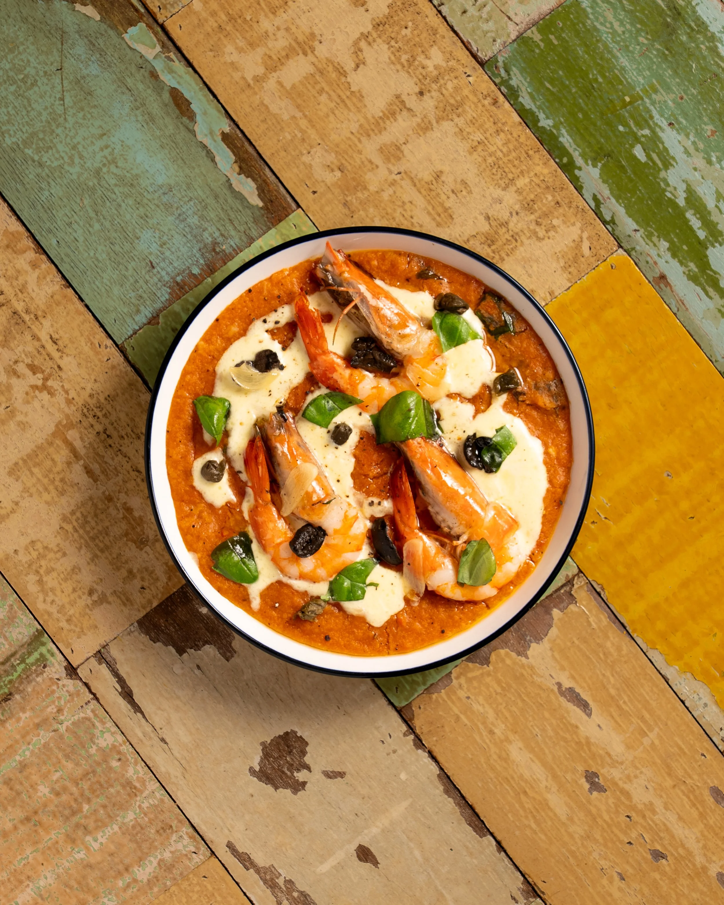 Gourmet prawn dish with creamy sauce shot by a professional photographer kl