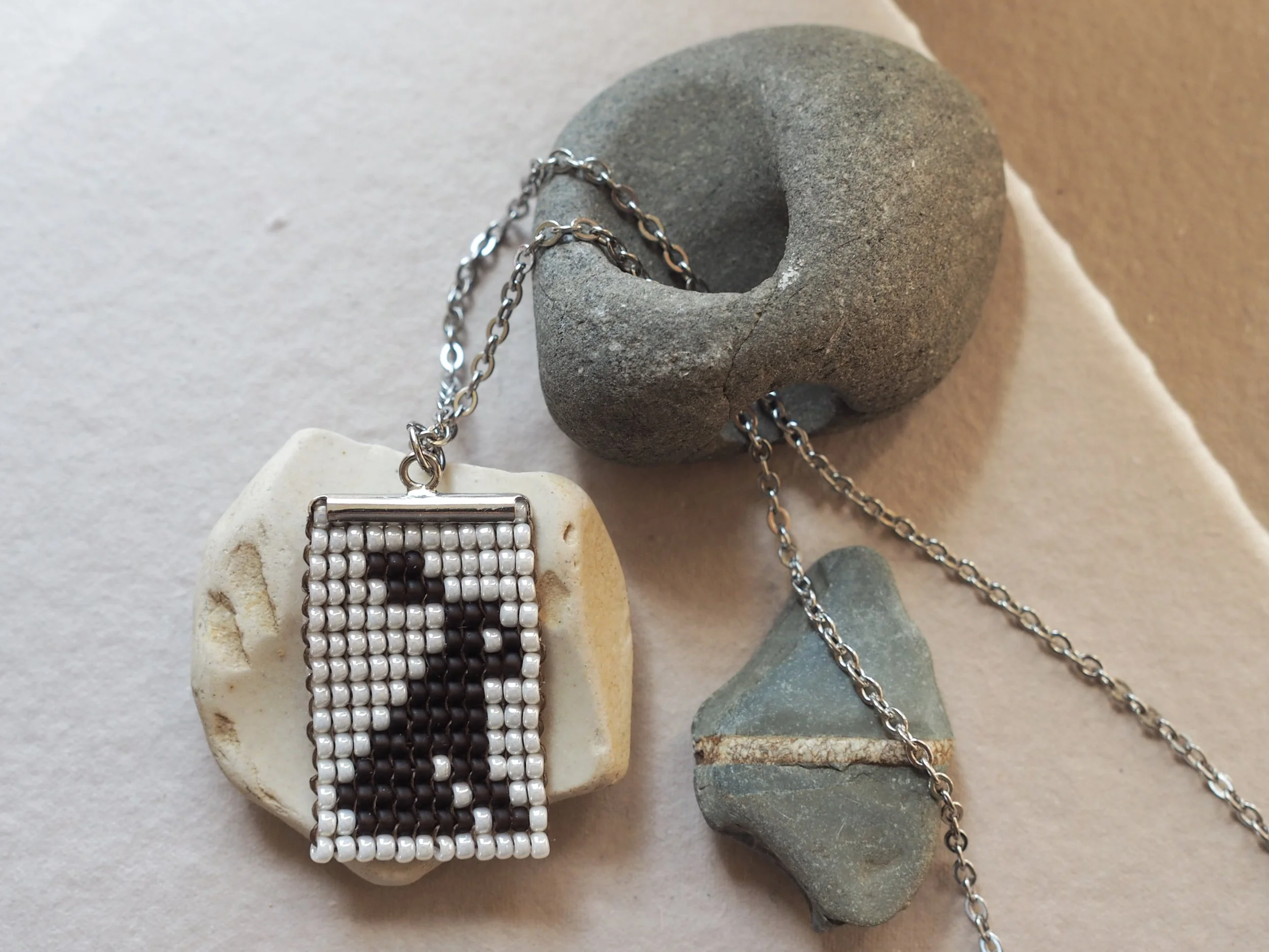 Rabbit: 11/0 miyuki beads, silver plated clasp, 24" stainless steal chain