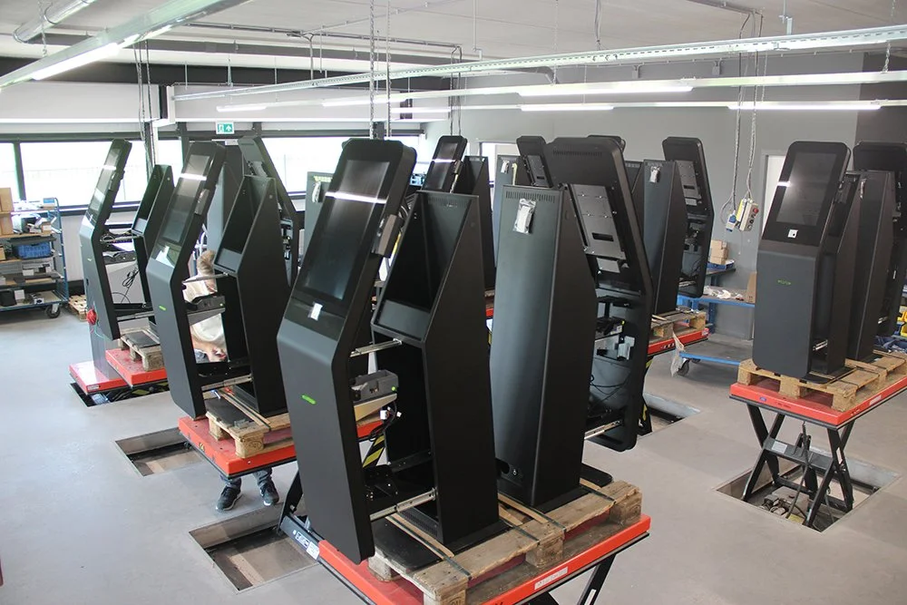 Multiple kiosks in the process of being manufactured