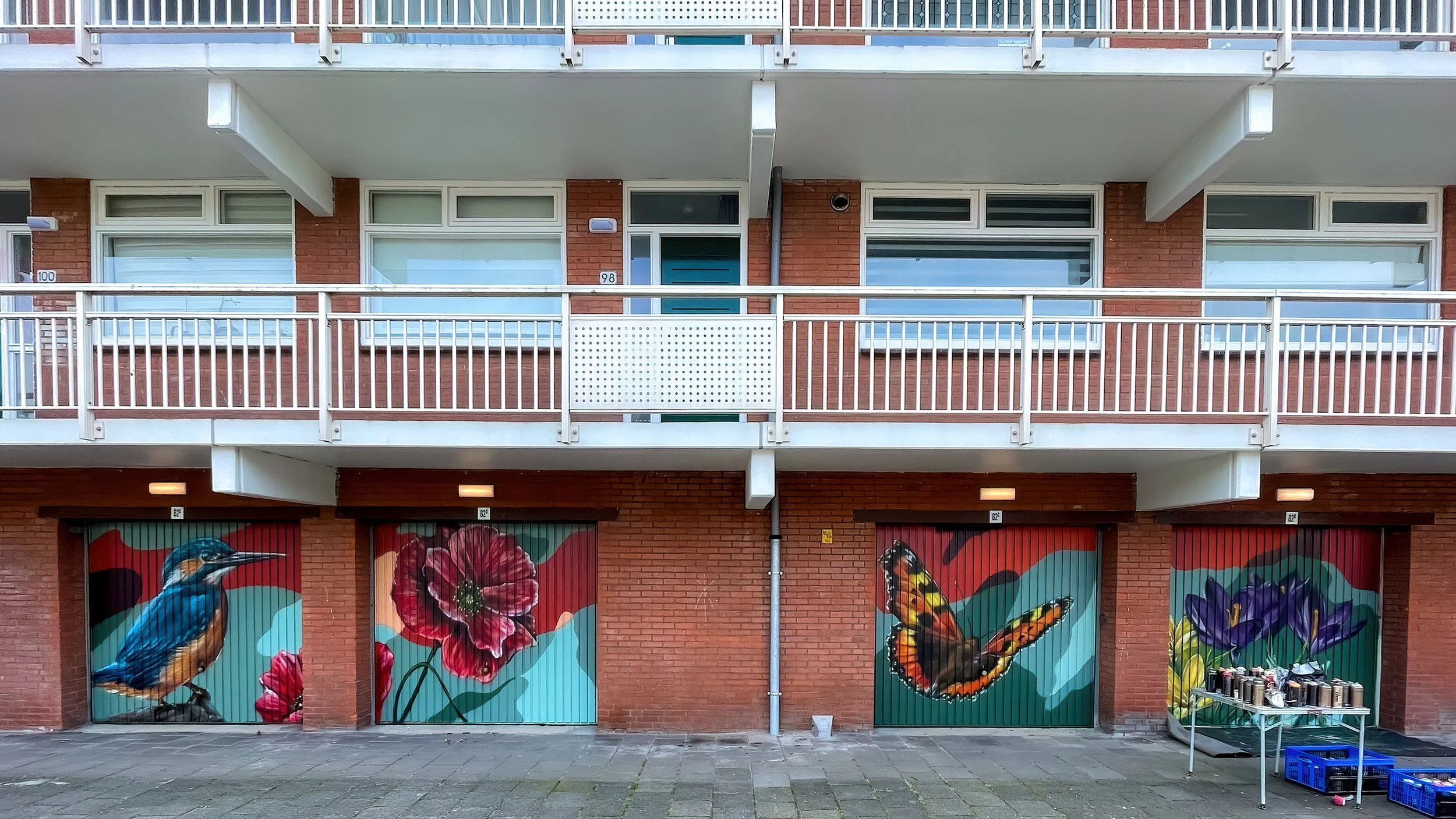 Muurschildering garageboxen parkeerplaats