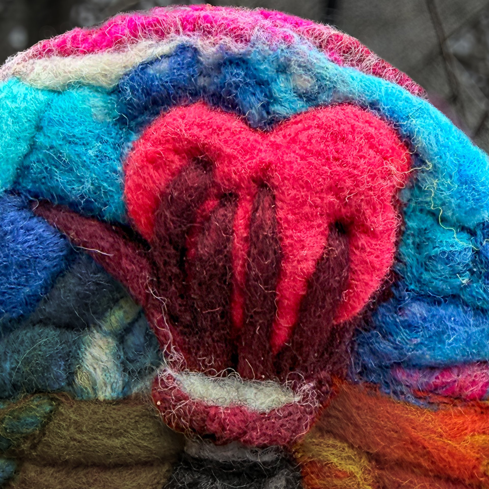 Close-up of textured wool ruin and sunrise representing healing and renewal