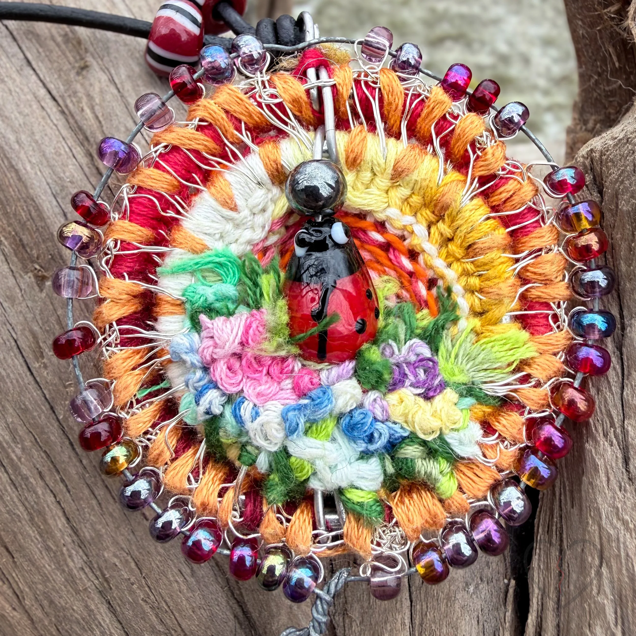Ladybug garden pendant with wool embroidery and bead pendulum