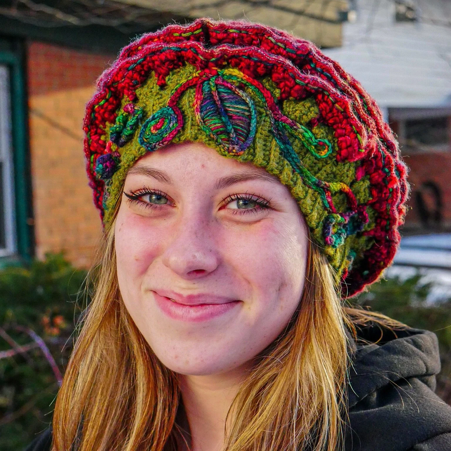 Direct portrait captures The Cosmic Rose as both sculpture and adornment, illustrating its emotional presence and relationship to the human form.