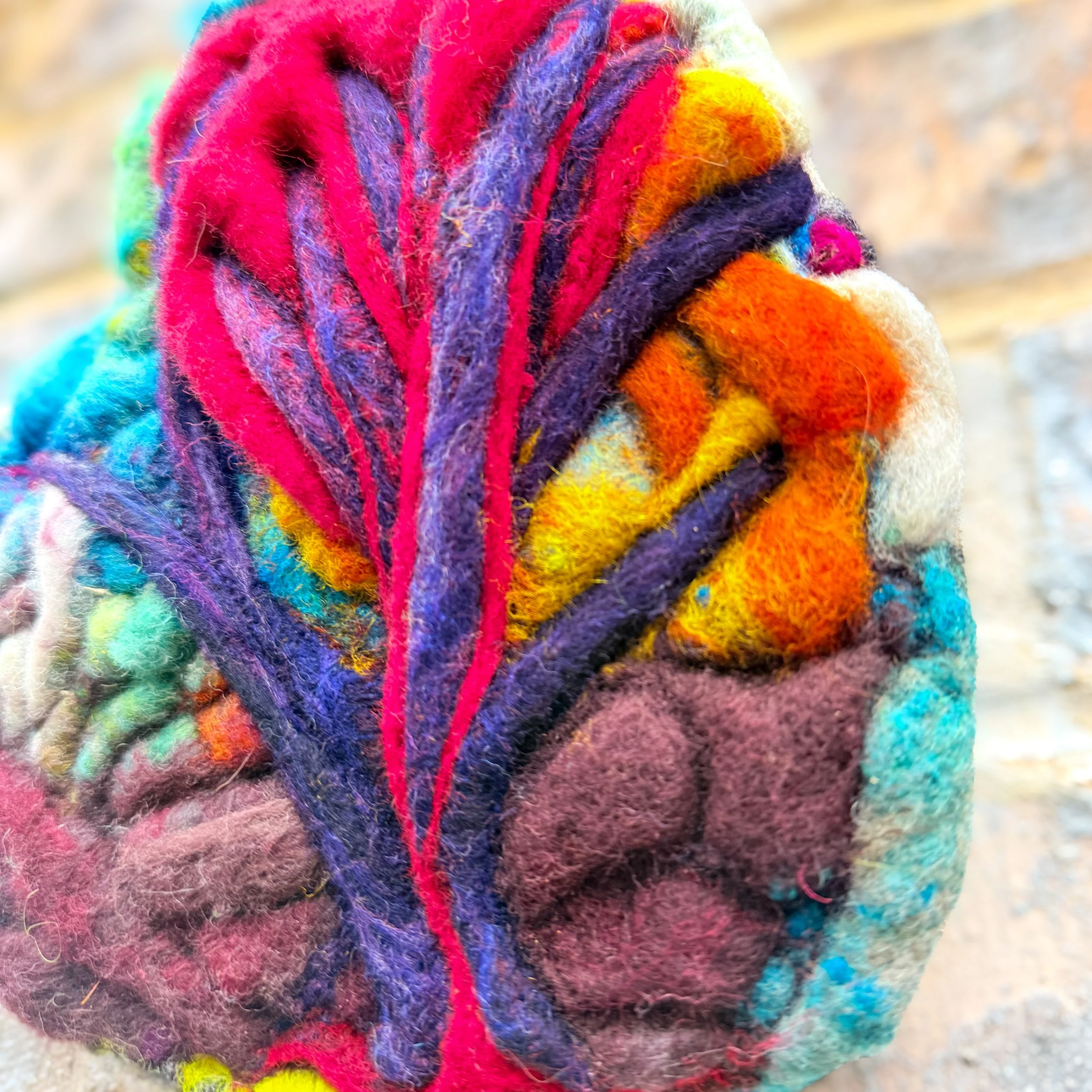 Pierced Compassion is a 7 x 8 inch needle felted wool artwork depicting a sunrise landscape pierced heart and tree of sorrow by fiber artist Kristi Yapp.