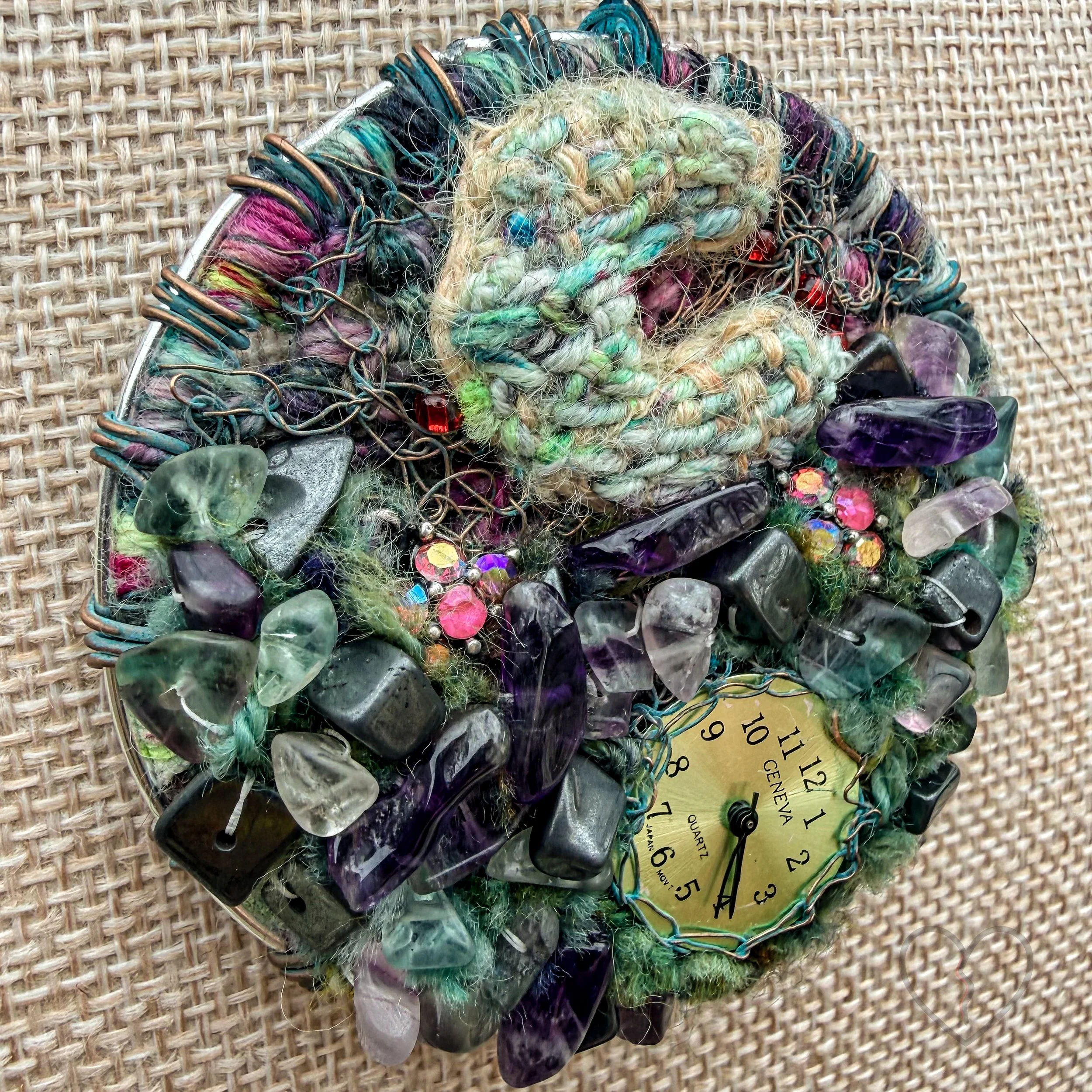 Mixed media fiber necklace with crystals and broken clock face on leather cord