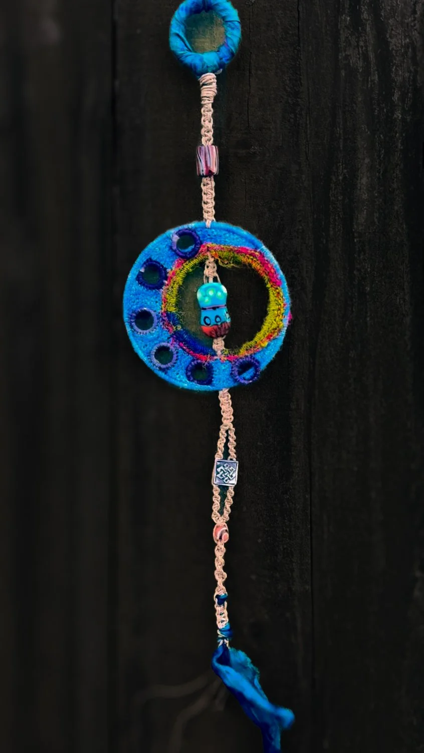 Blue crescent moon dreamcatcher with watchful eye bead and trade beads.
