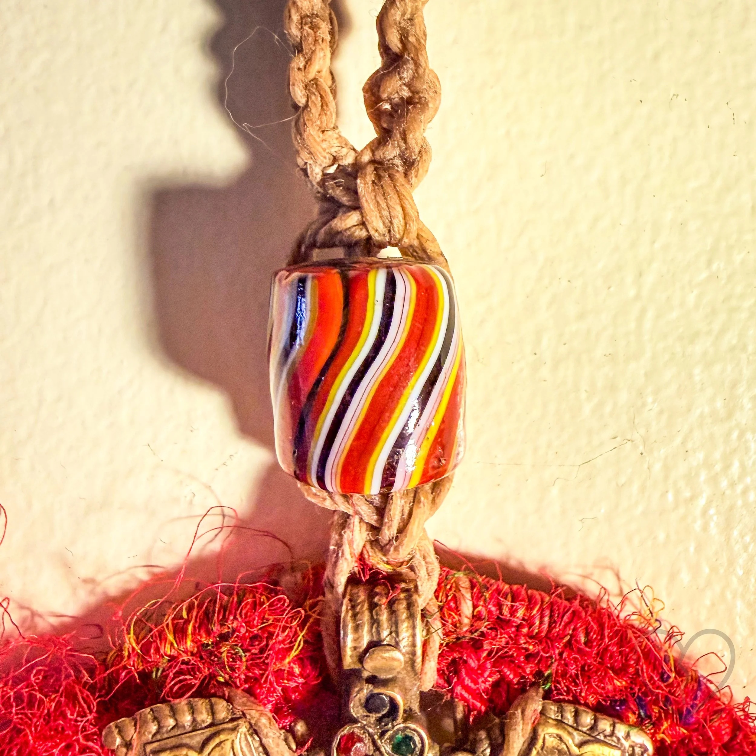 Fiber art necklace with reclaimed pendant, sari silk halo and macrame hemp cord by Kristi Yapp