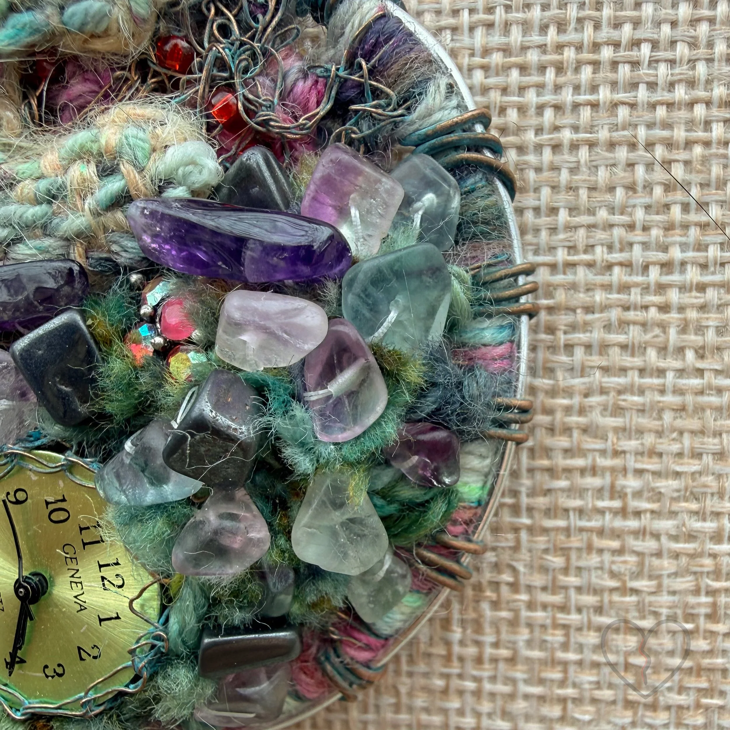Mixed media fiber necklace with crystals and broken clock face on leather cord