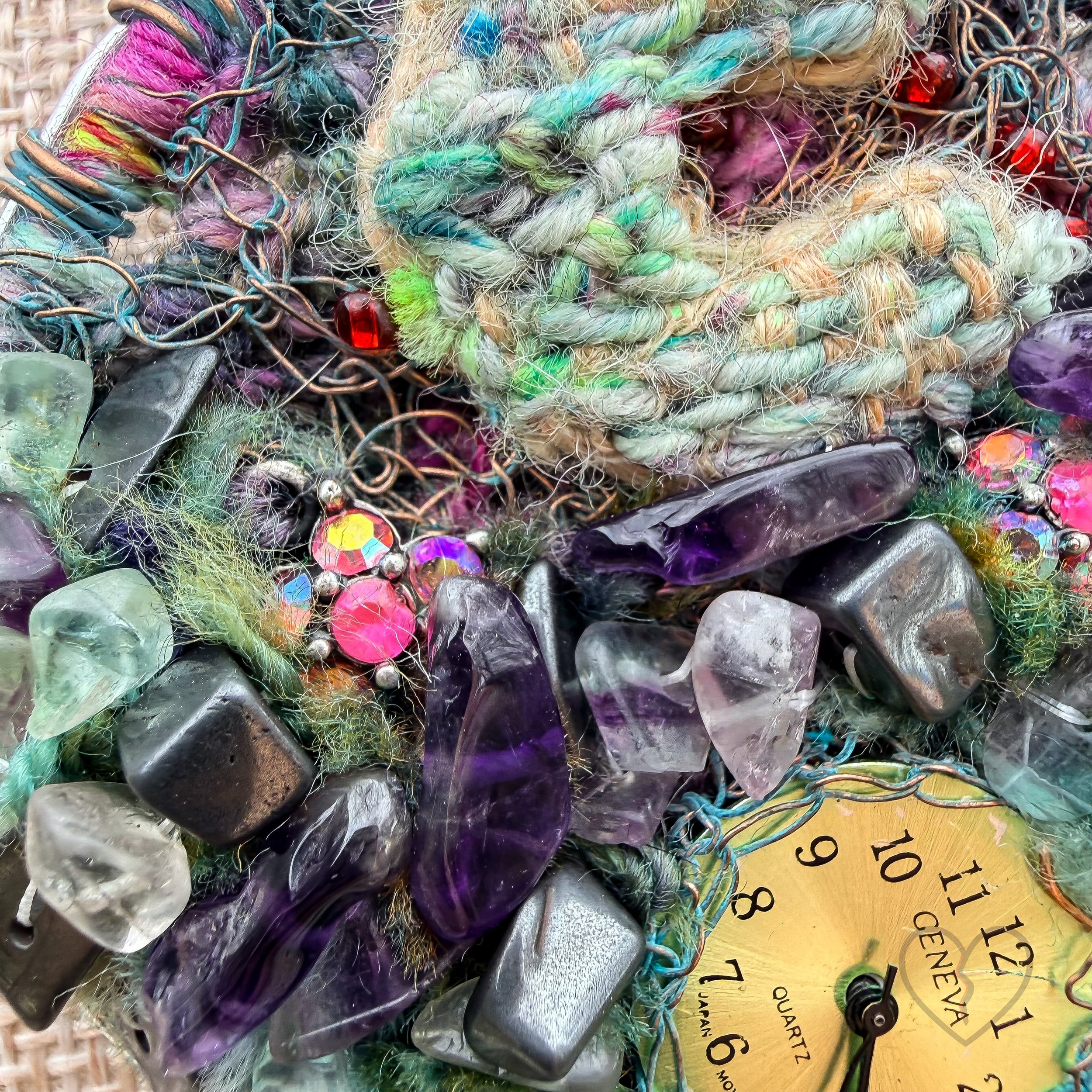 Mixed media fiber necklace with crystals and broken clock face on leather cord