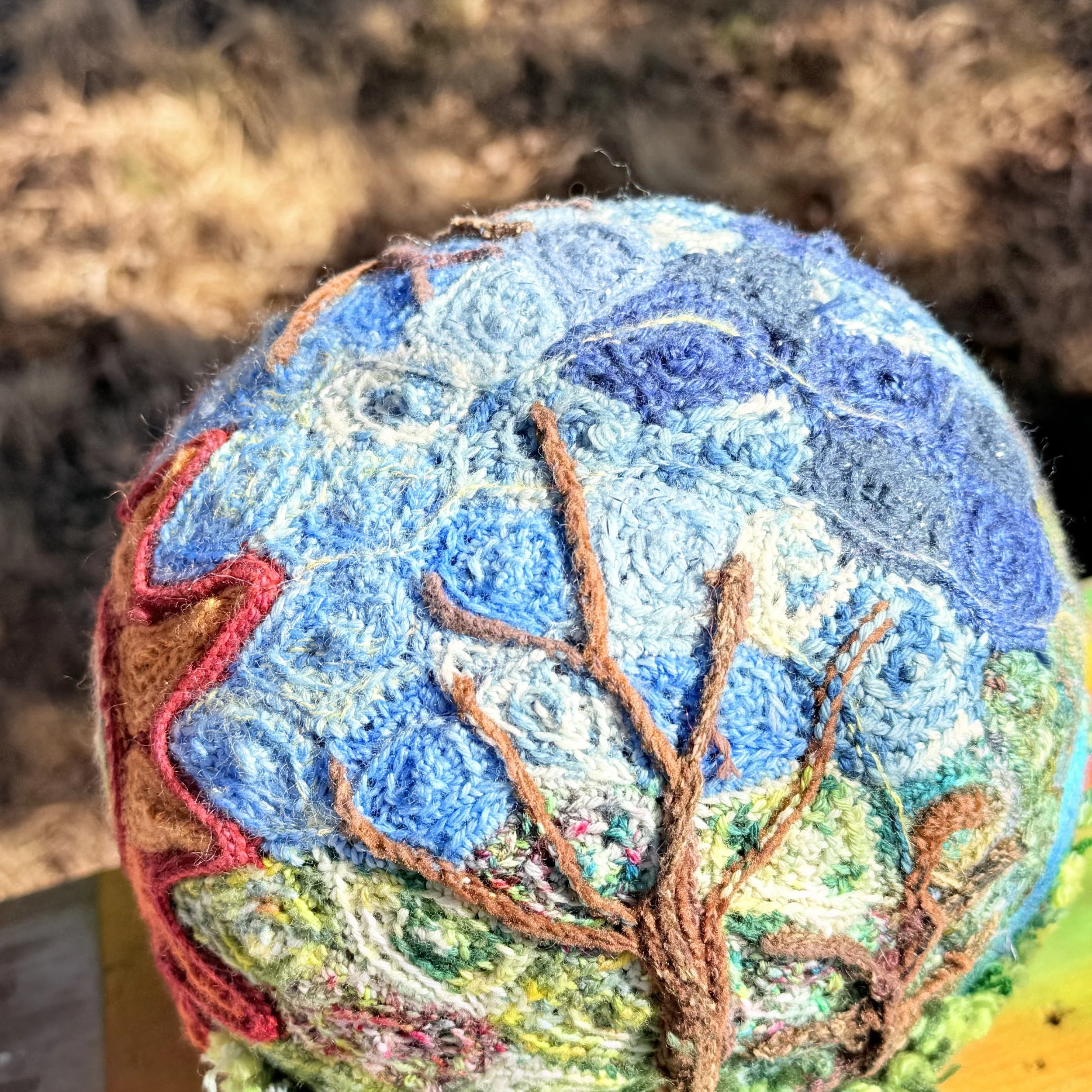 Symbolic nature inspired design featuring sun spiral, trees, sky, and earth textures representing clarity, grounding, and natural truth.