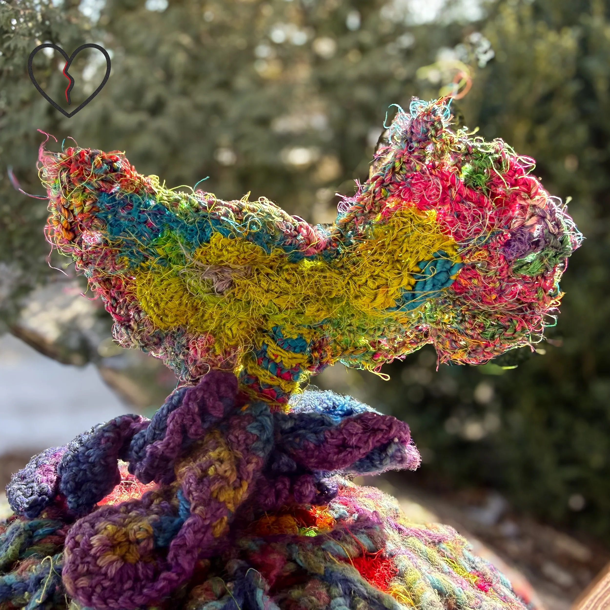 Crown detail showing Seussian silk tail in diving form