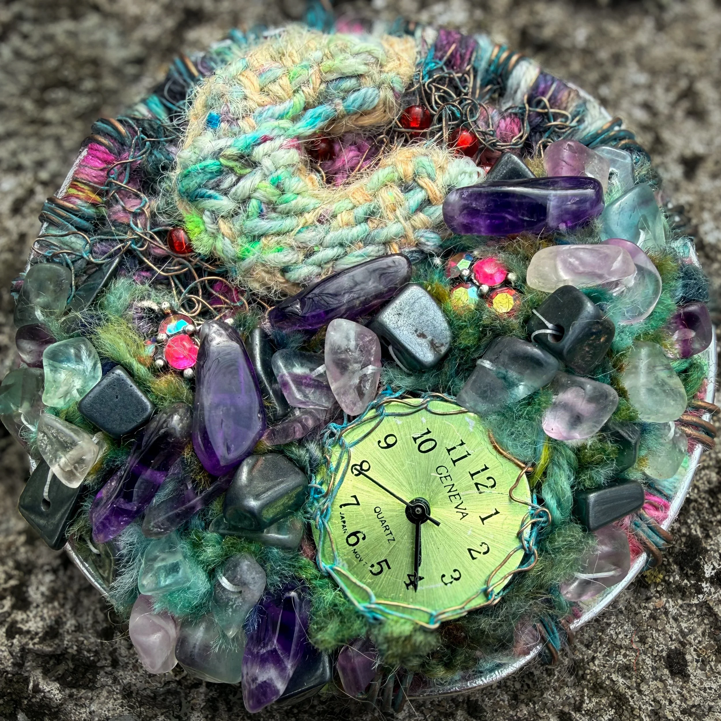 Mixed media fiber necklace with crystals and broken clock face on leather cord