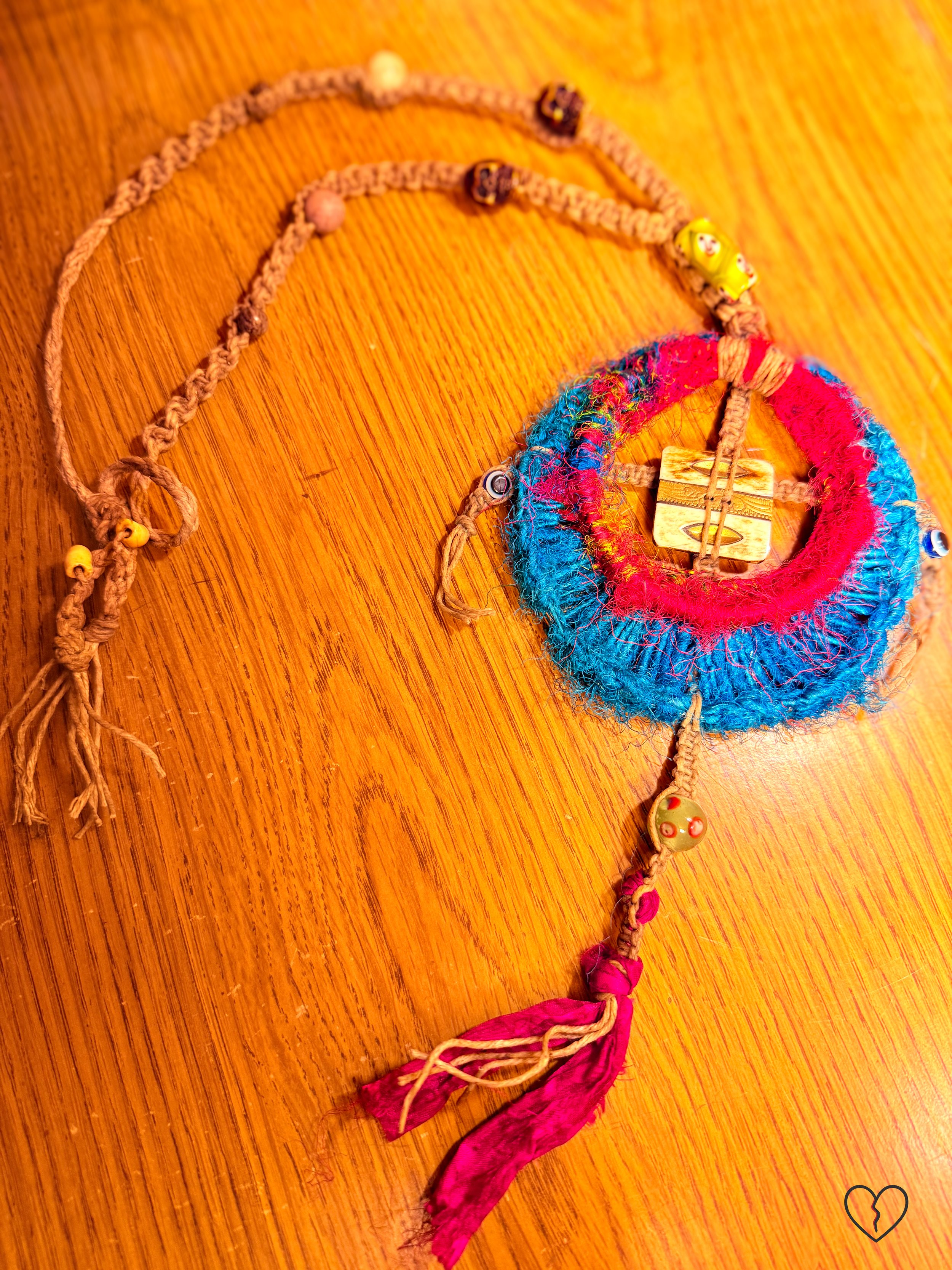 Macrame hemp cord with peach jasper and resin skull beads