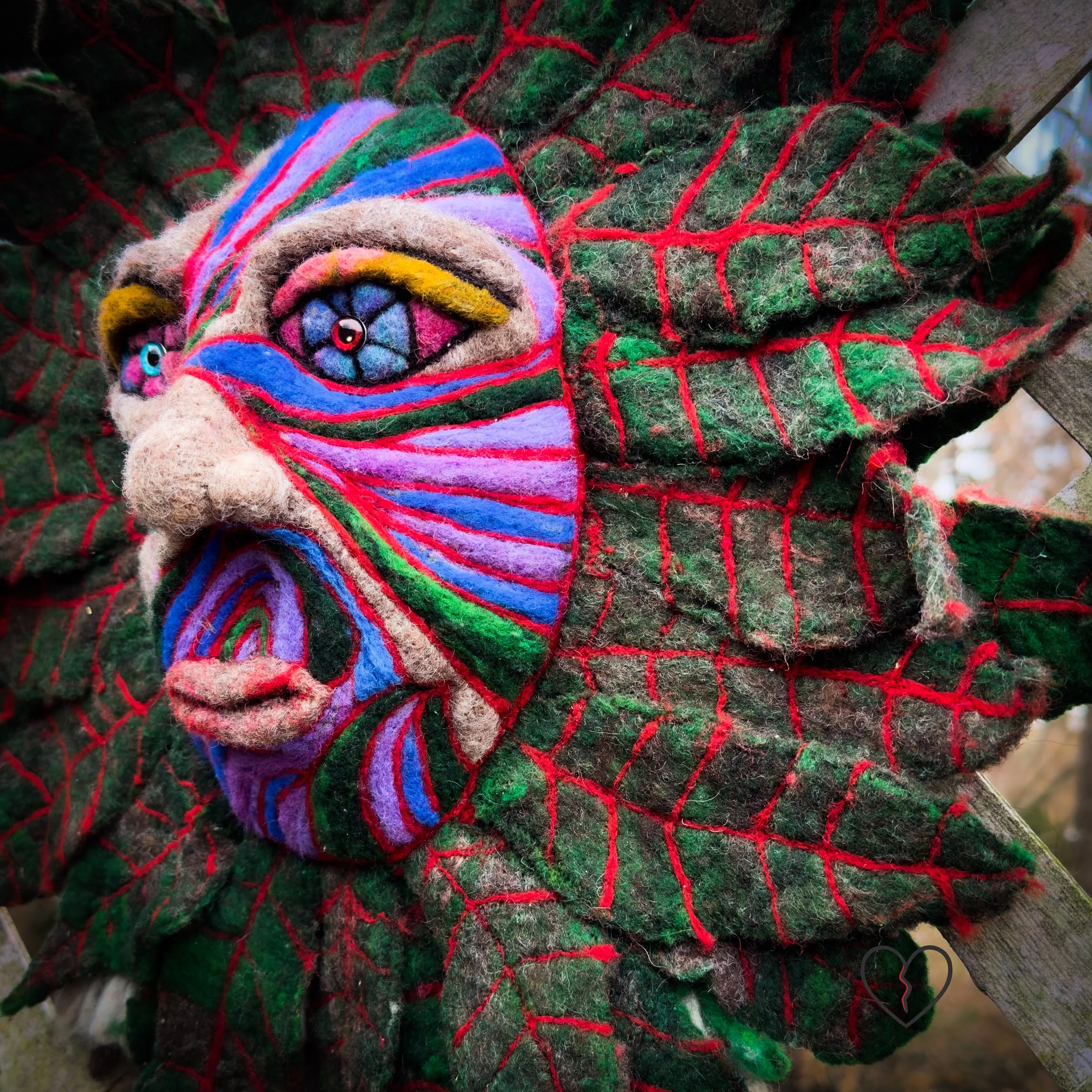 Environmental fiber art wall sculpture inspired by land memory