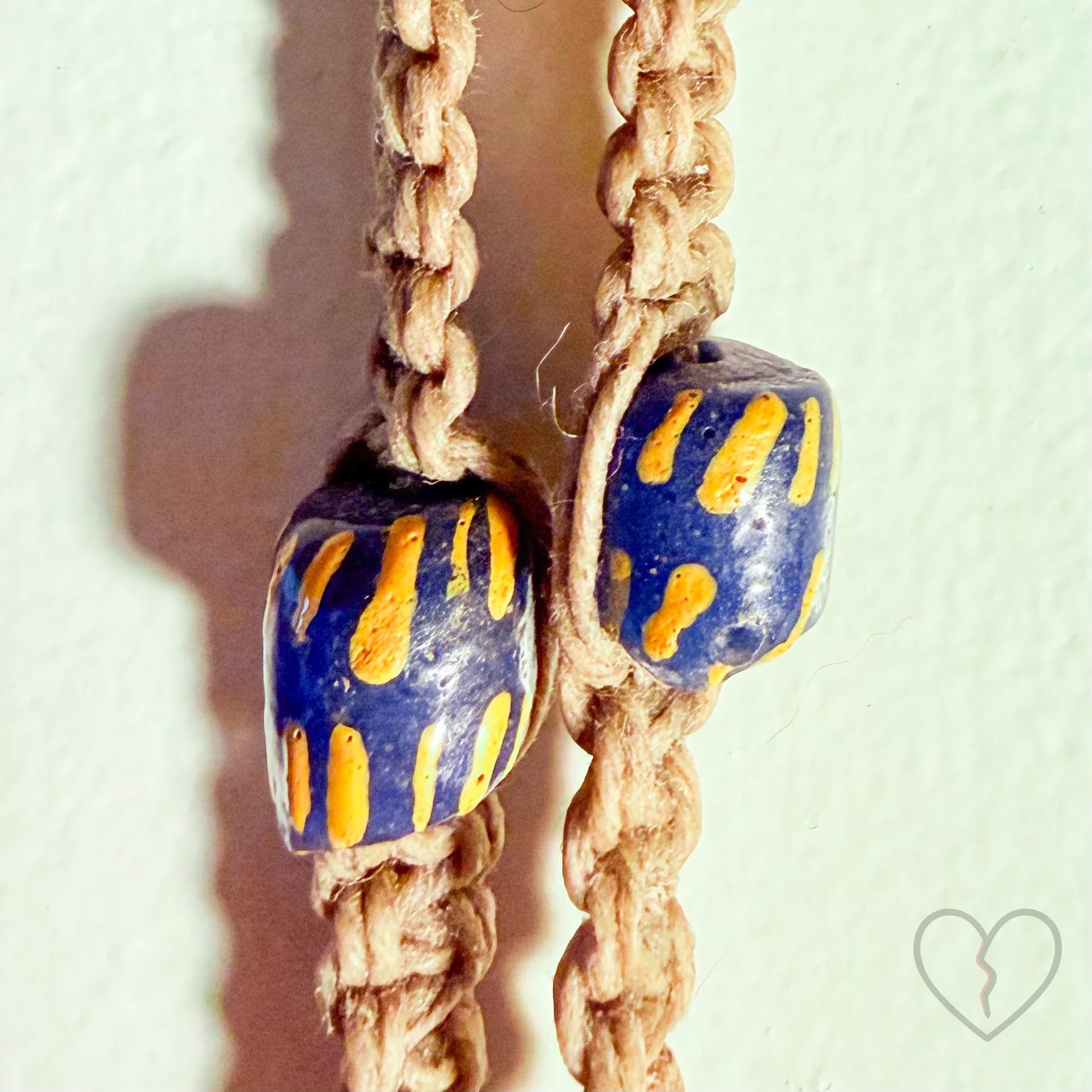 Fiber art necklace with reclaimed pendant, sari silk halo and macrame hemp cord by Kristi Yapp