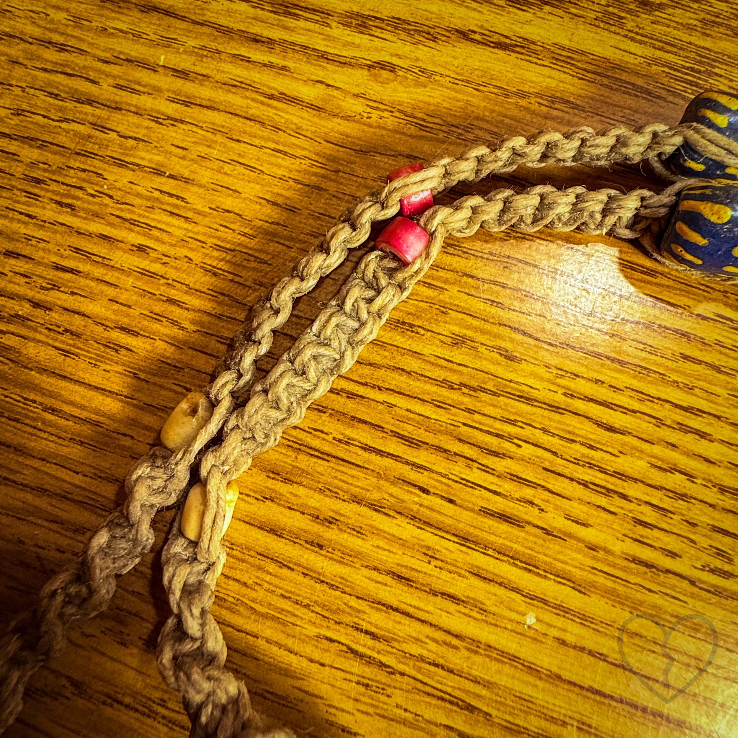 Fiber art necklace with reclaimed pendant, sari silk halo and macrame hemp cord by Kristi Yapp